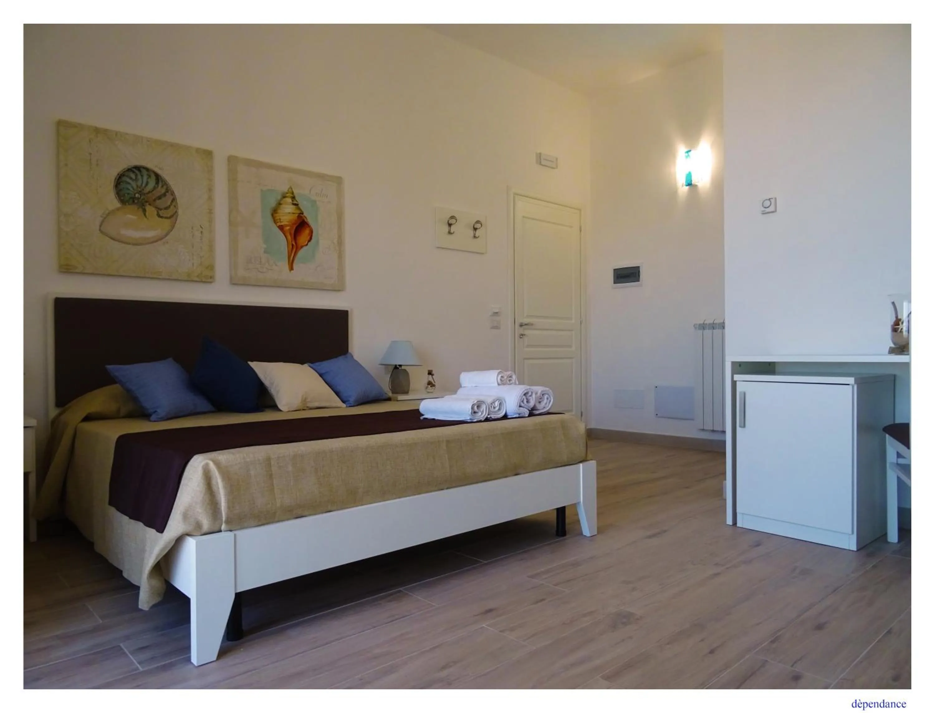 Bed in Faro Bianco Gallipoli Dependance