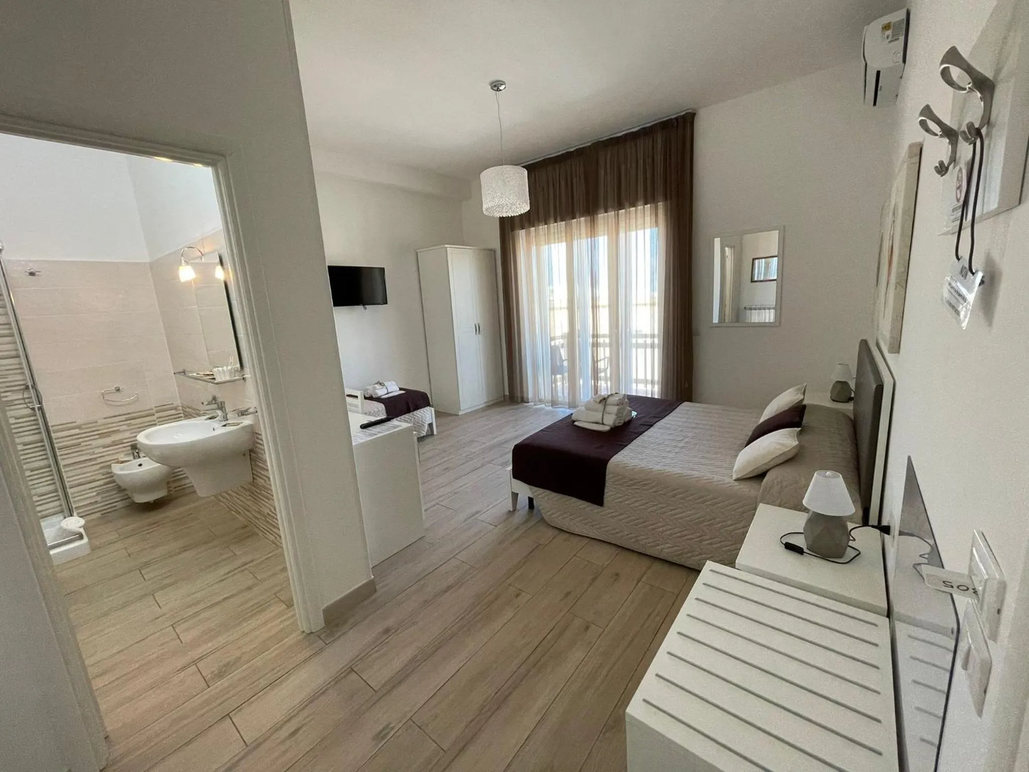 Bed in Faro Bianco Gallipoli Dependance