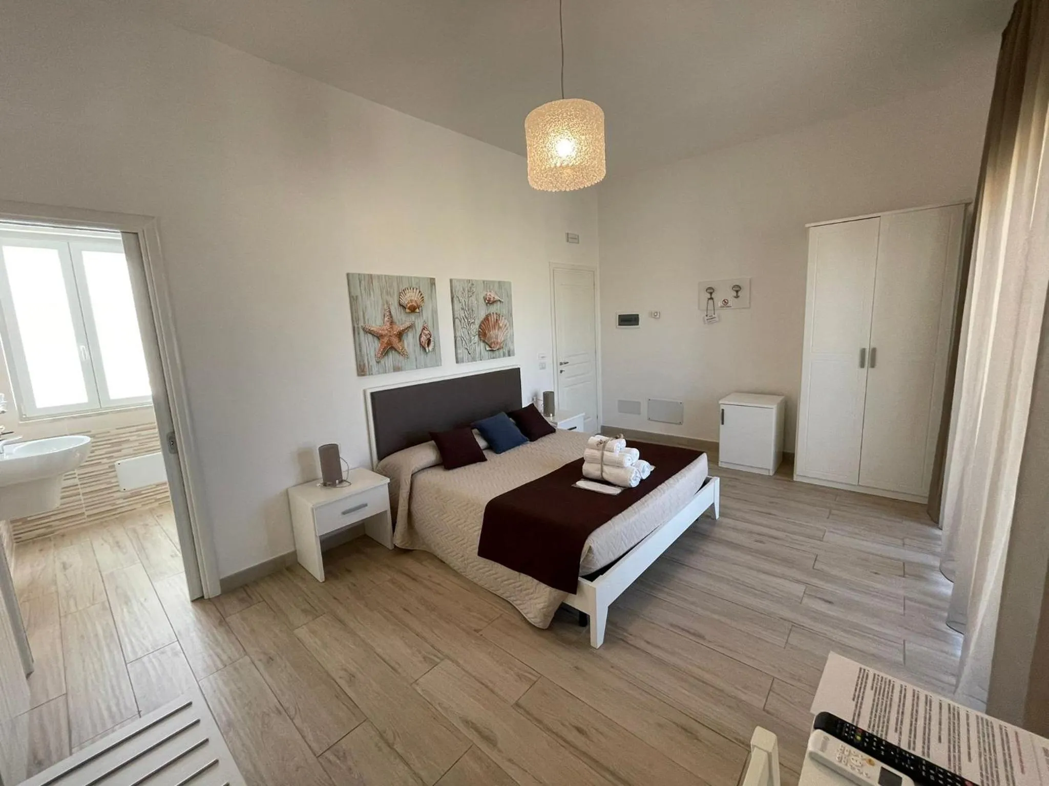 Bed in Faro Bianco Gallipoli Dependance