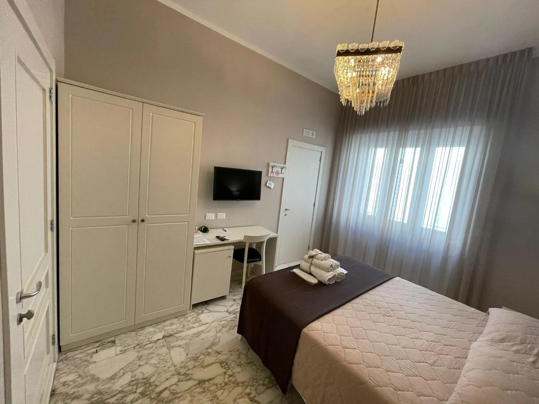 Bed in Faro Bianco Gallipoli Dependance