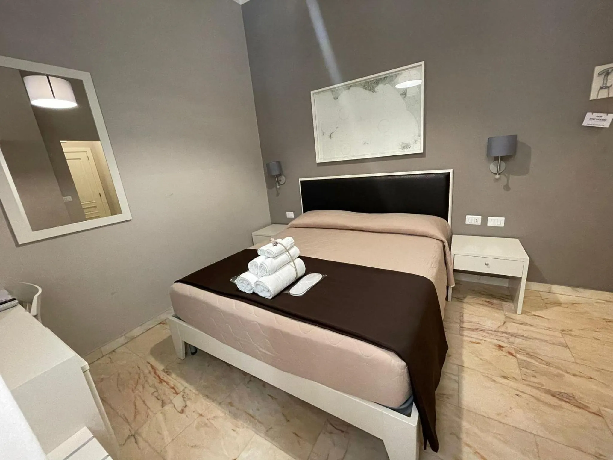 Bed in Faro Bianco Gallipoli Dependance