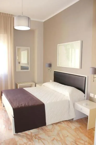 Photo of the whole room, Bed in Faro Bianco Gallipoli Dependance