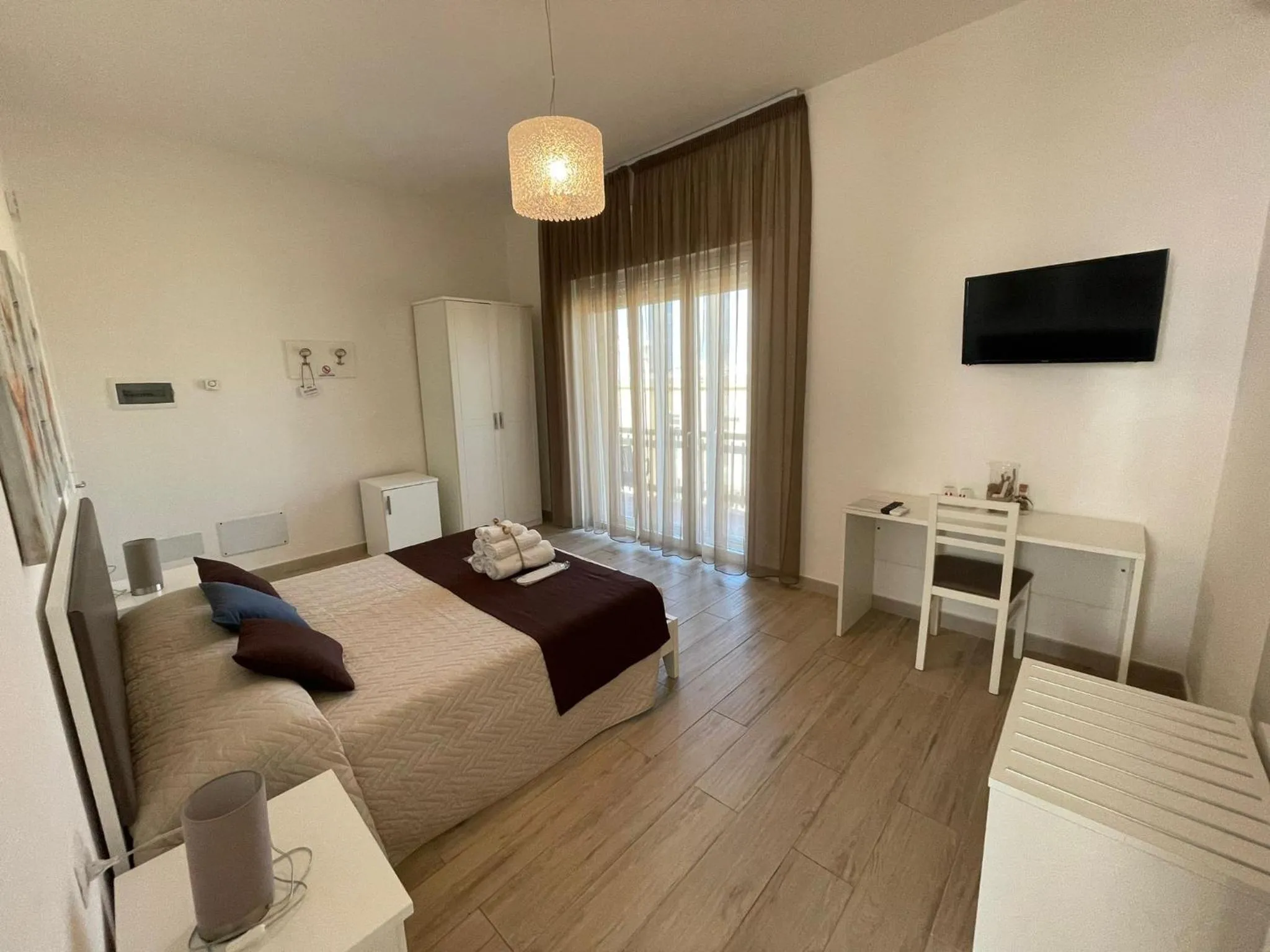 Bed in Faro Bianco Gallipoli Dependance