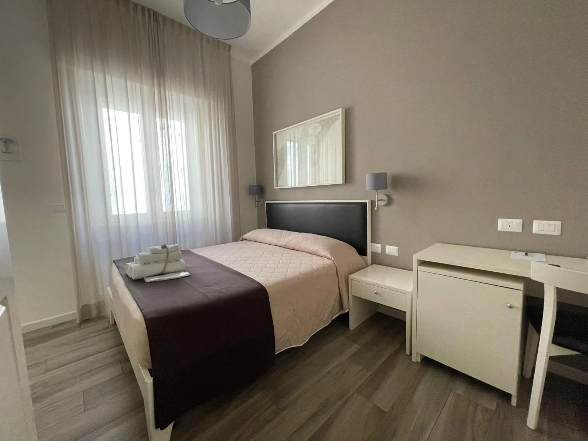 Bed in Faro Bianco Gallipoli Dependance