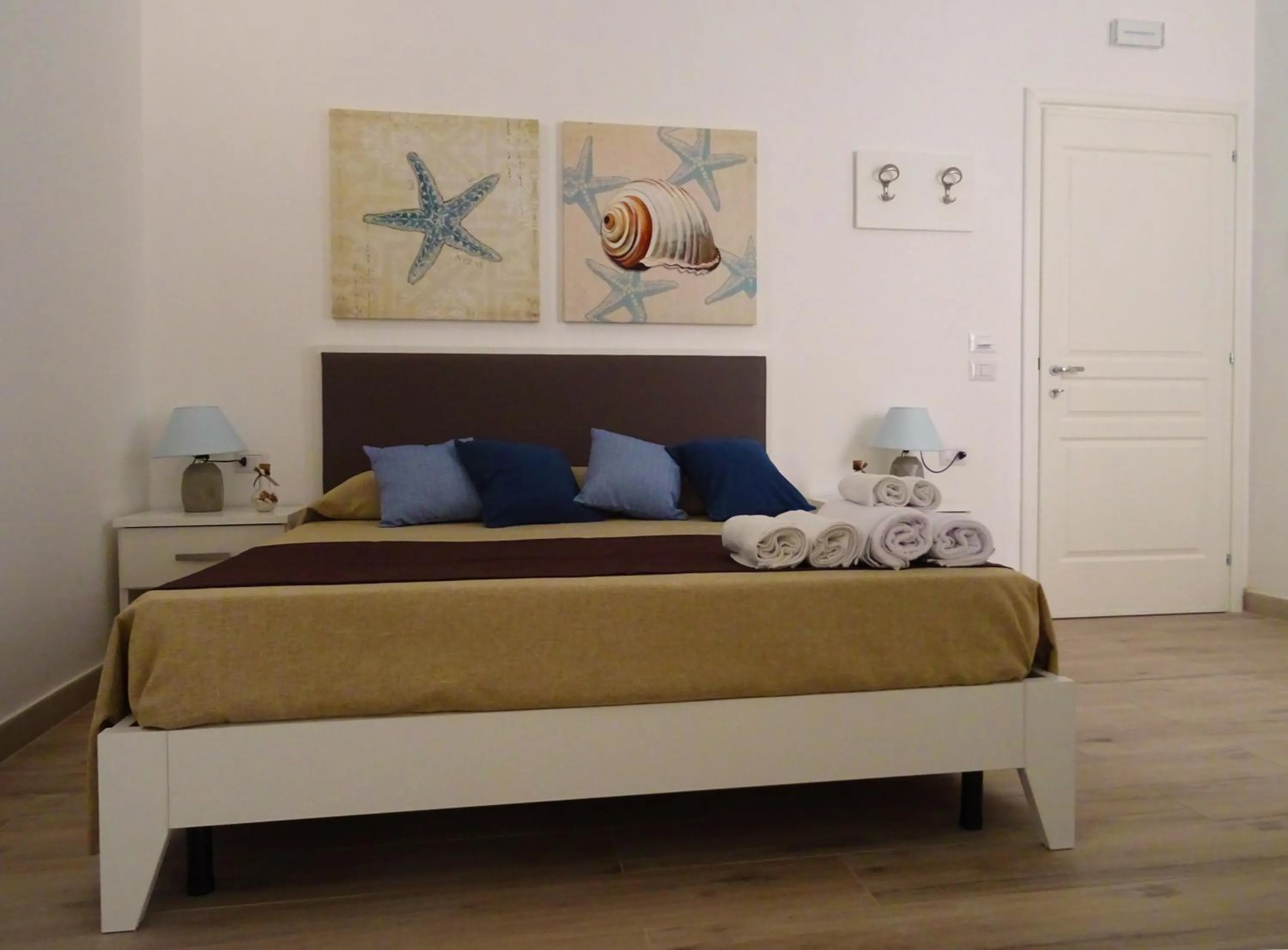 Bed in Faro Bianco Gallipoli Dependance