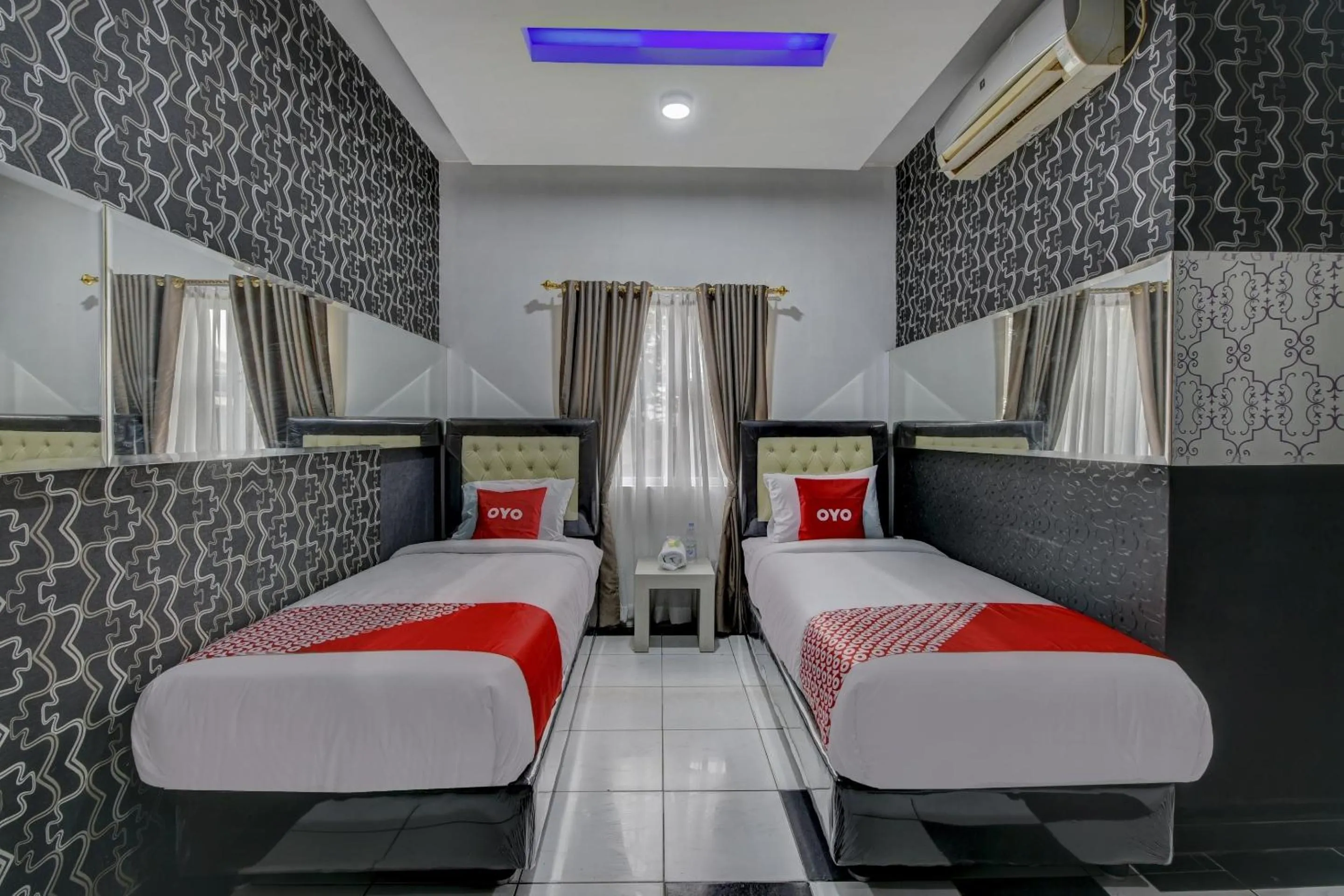 Bedroom in Super OYO 4010 Zaara Guest House Syariah