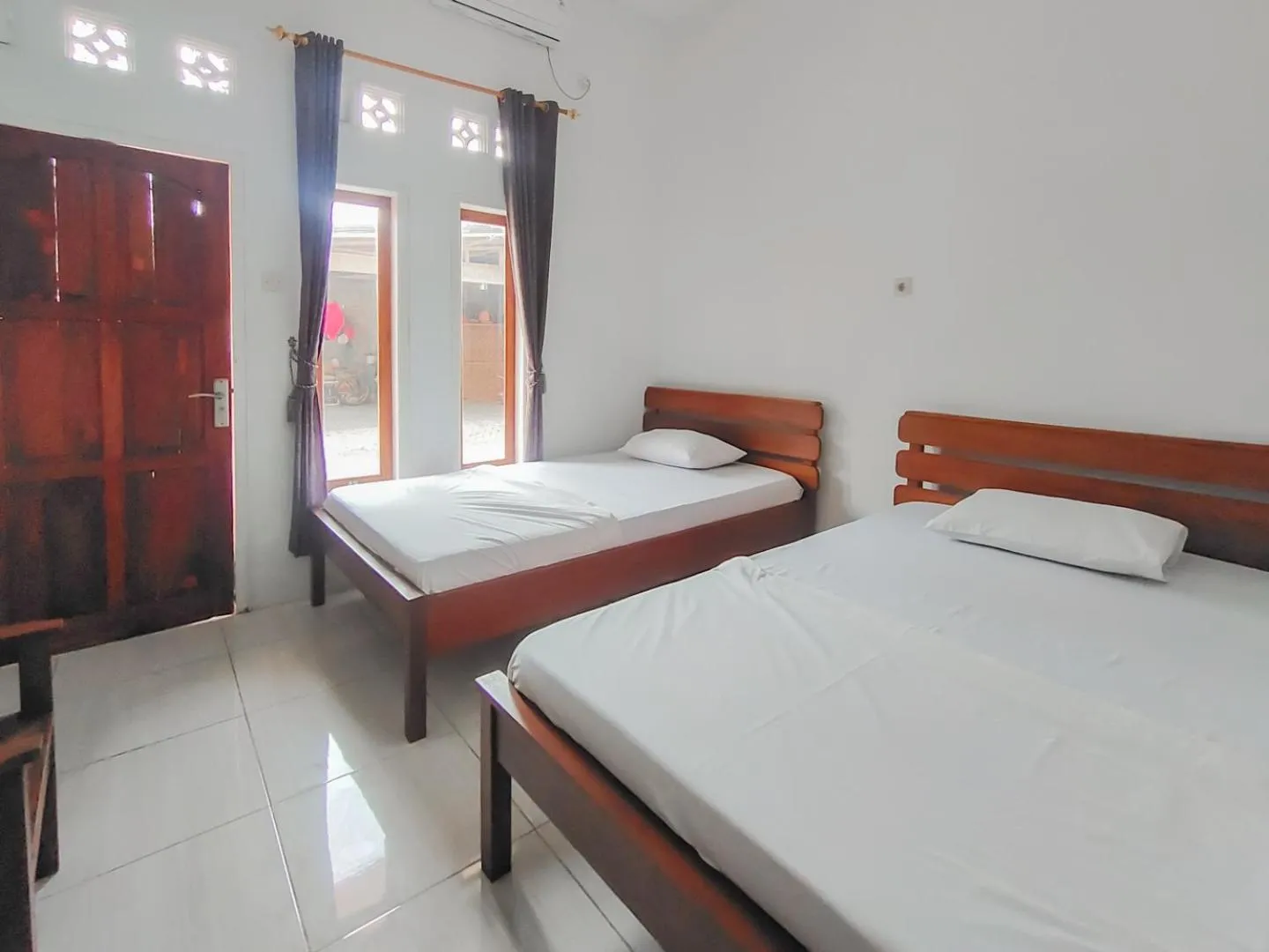 Bedroom, Bed in RedDoorz near Pamugaran Beach Pangandaran