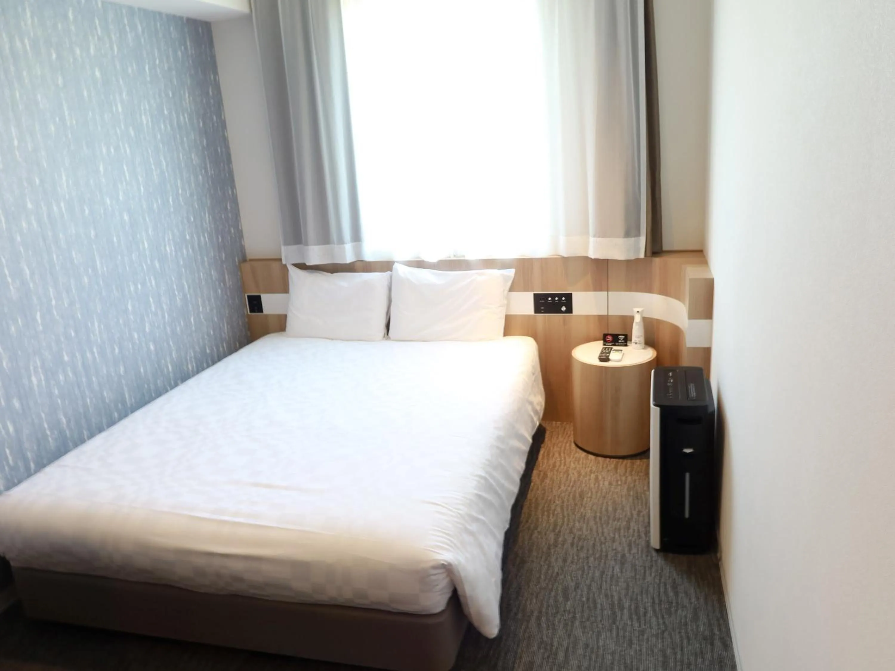 Bedroom, Bed in Henn na Hotel Komatsu Ekimae