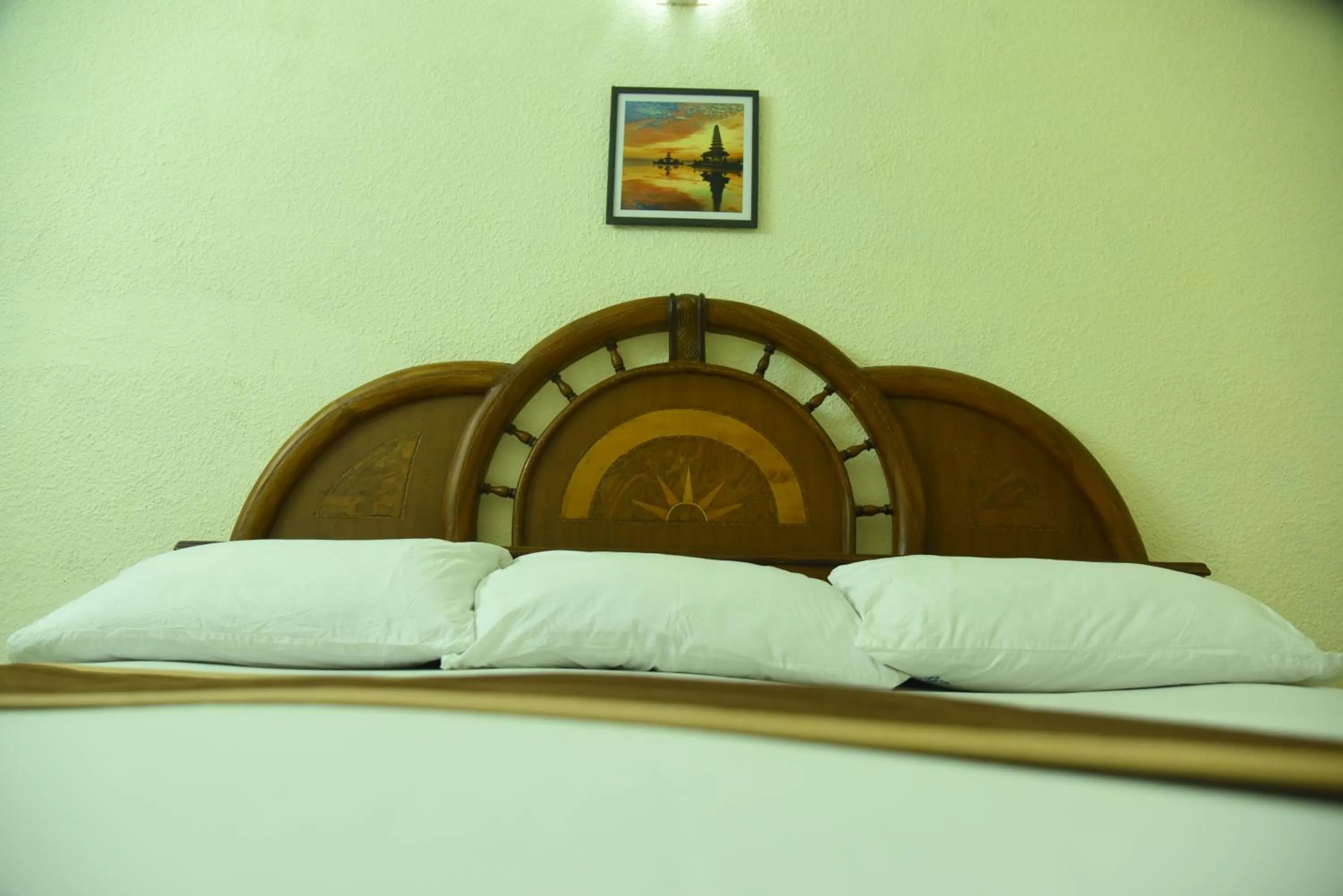 Bed in Hotel Raja Palace