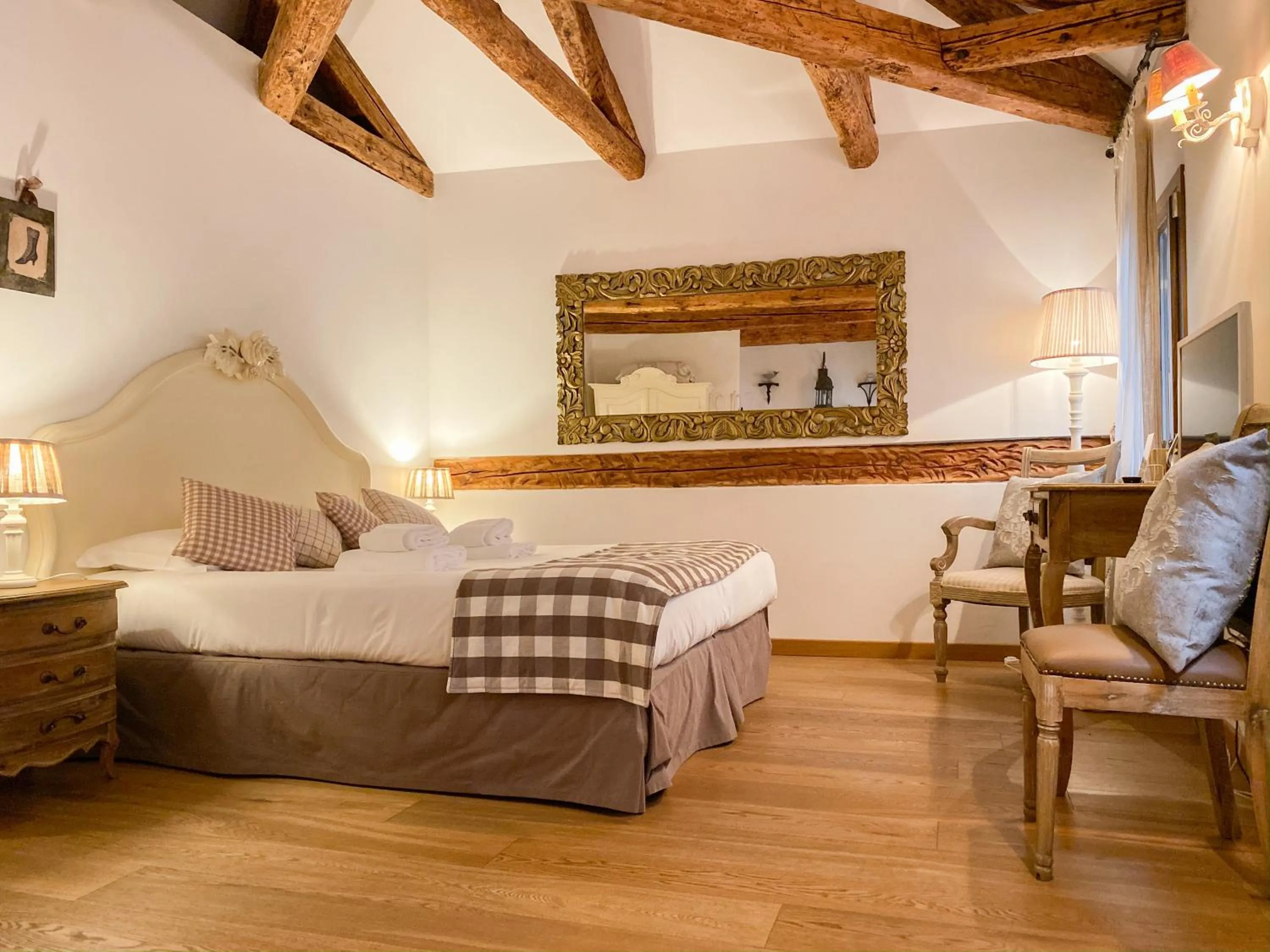 Photo of the whole room, Bed in Rigoletto Charm