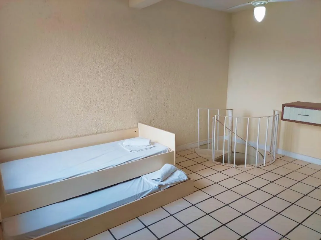 Bed in Morro do Sol Hotel & Eventos