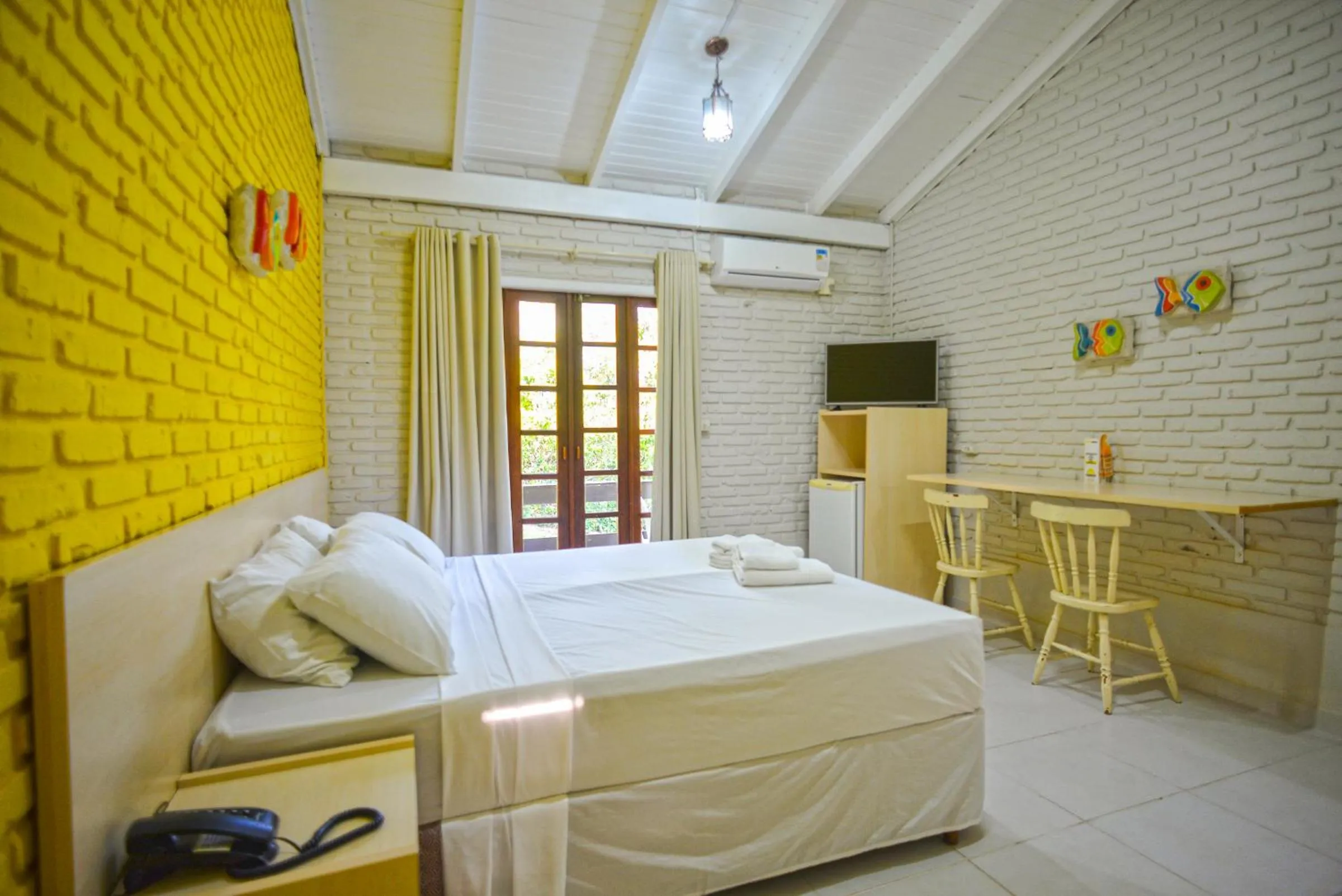 Bed in Morro do Sol Hotel & Eventos