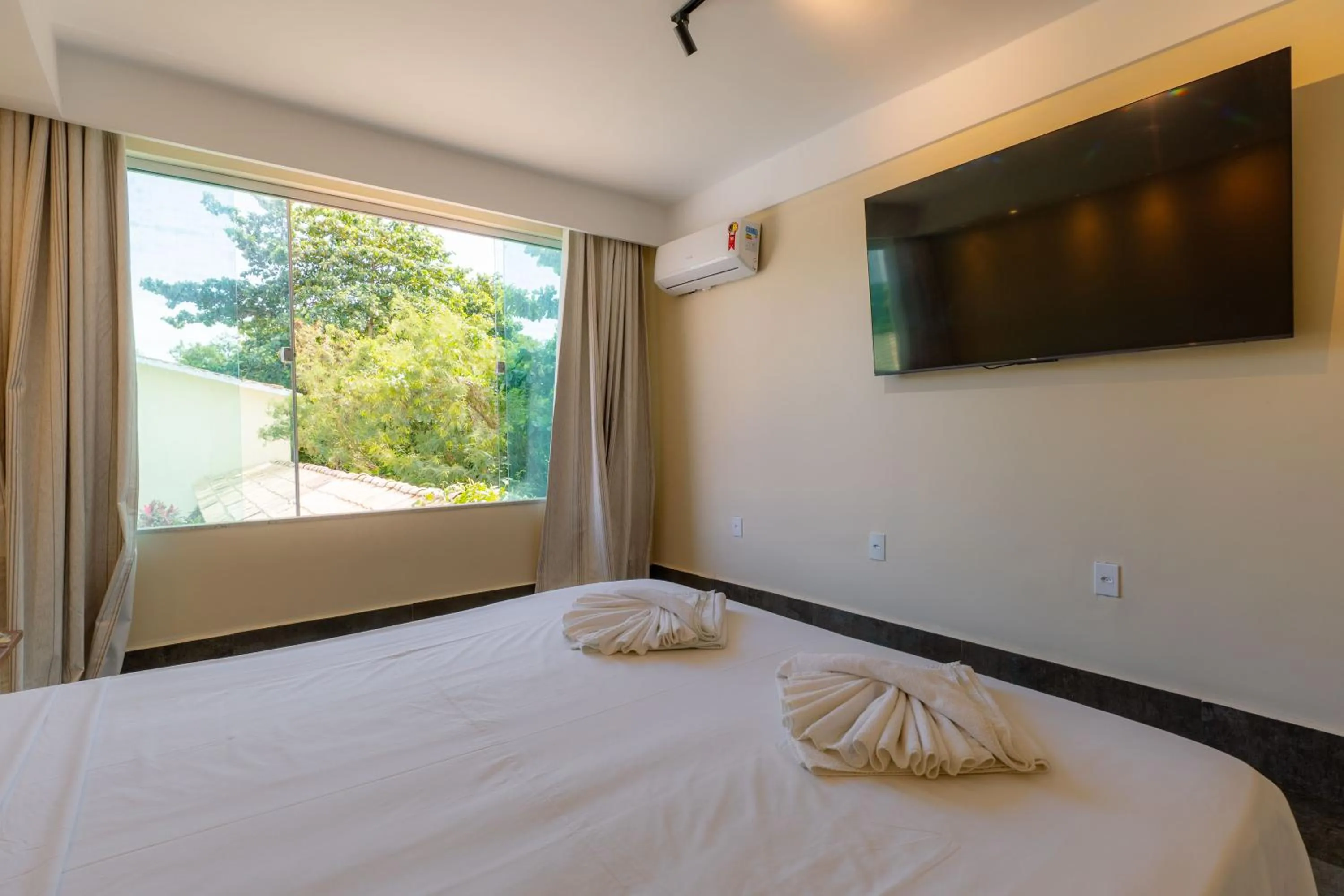 Bed in Kauatá Boutique Praia Hotel