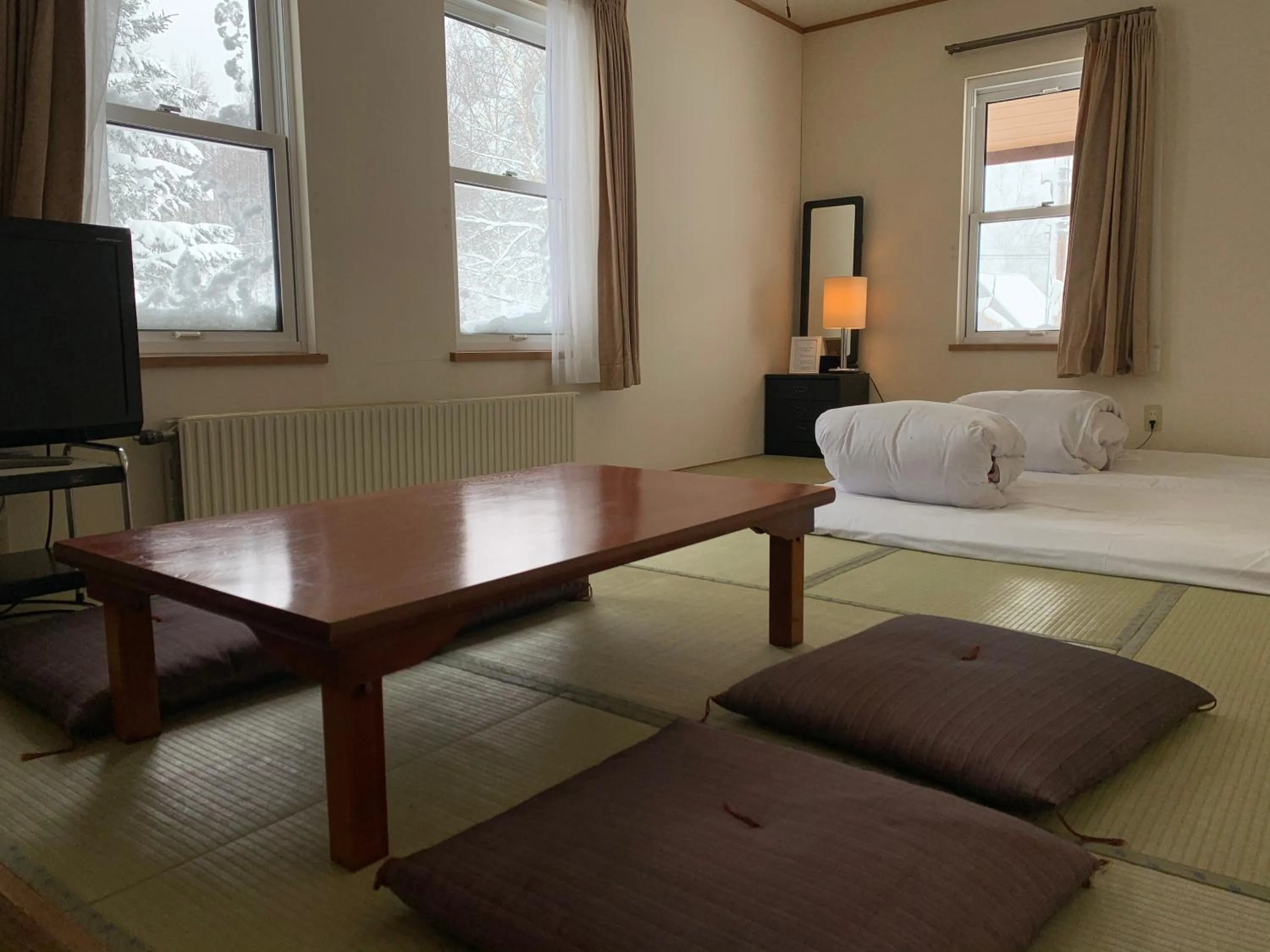 Seating area, Bed in Niseko Ski Lodge - Higashiyama