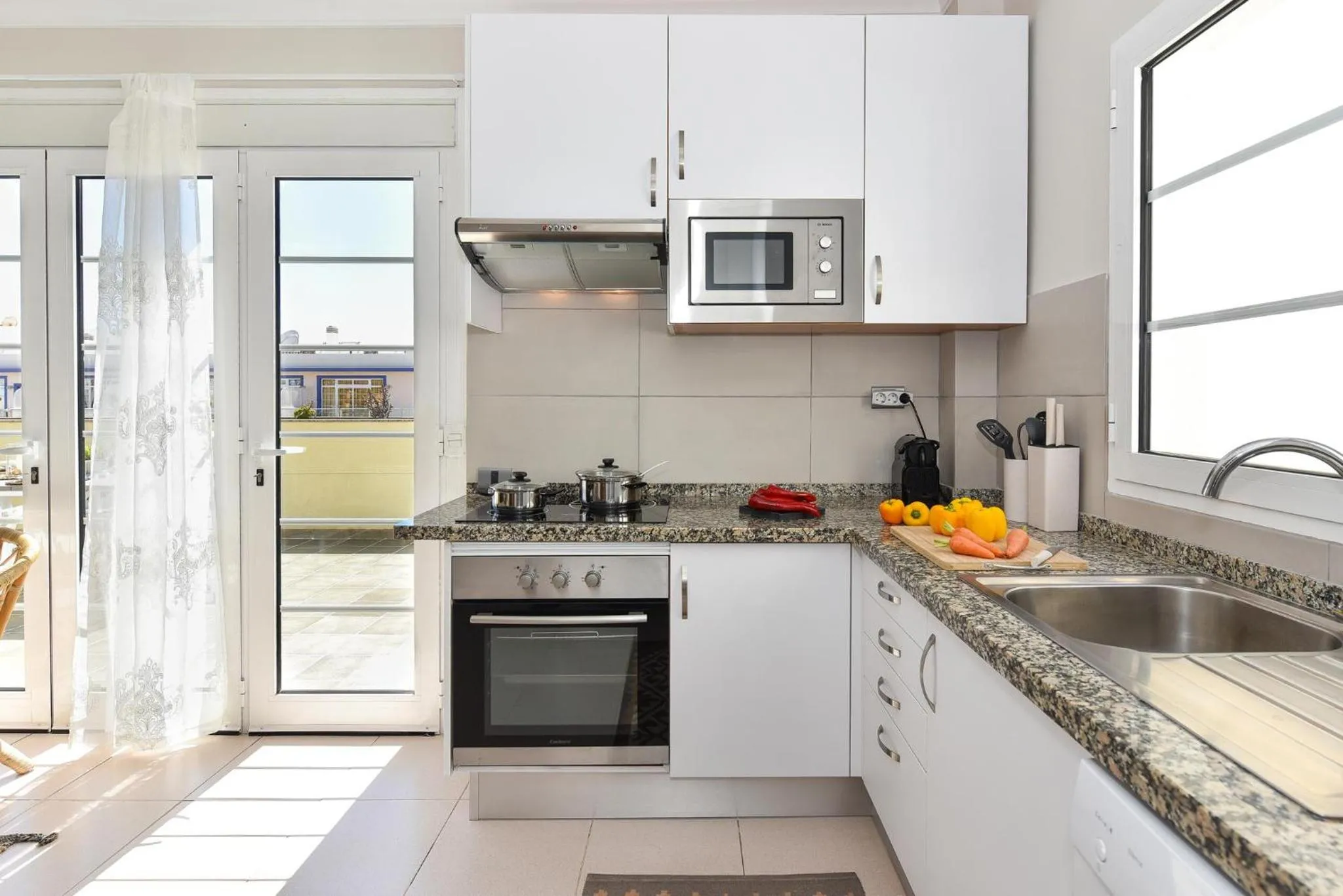 Kitchen or kitchenette in Penthouse Daniela in Puerto Mogan IX