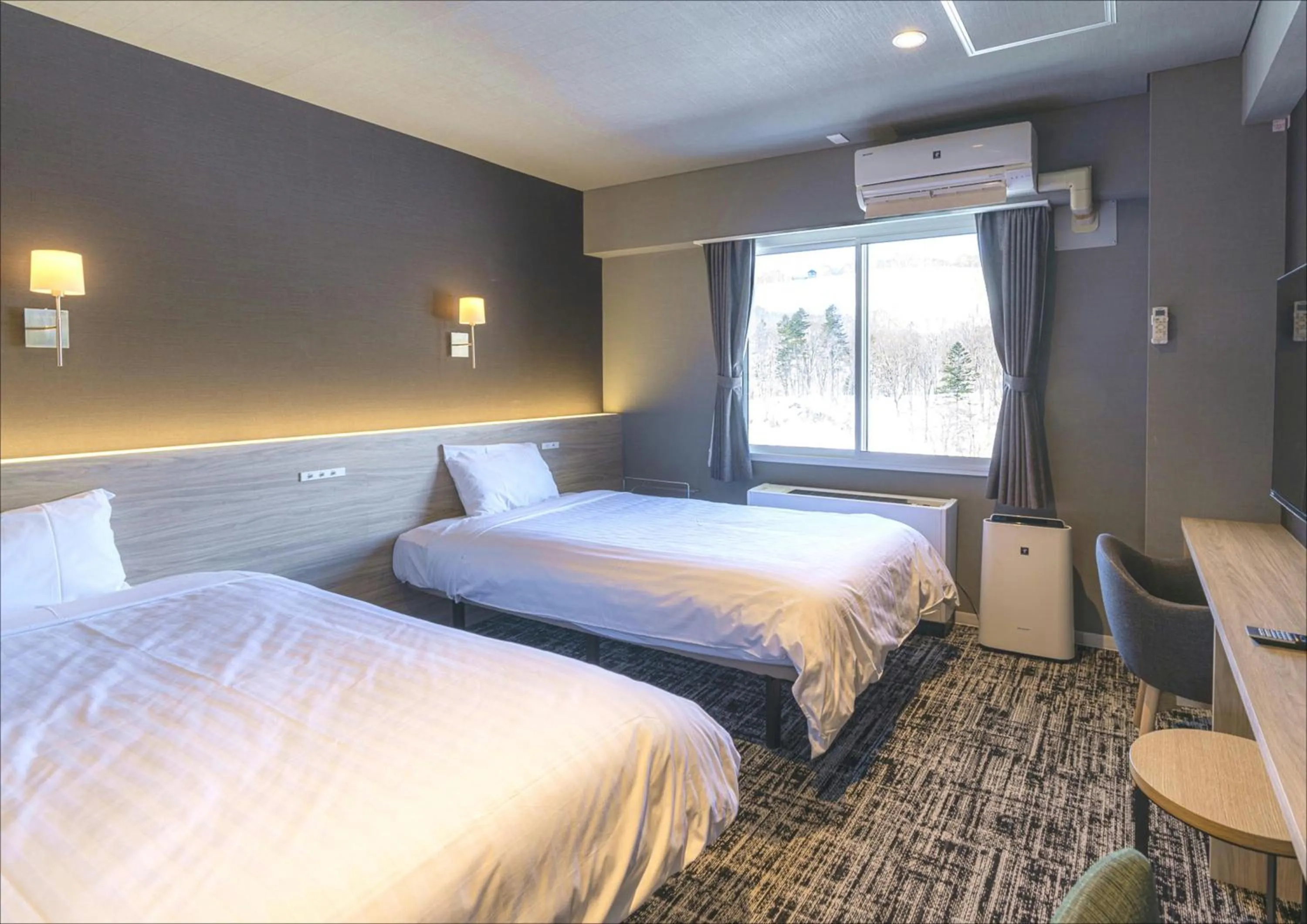 Bed in Niseko Grand Hotel