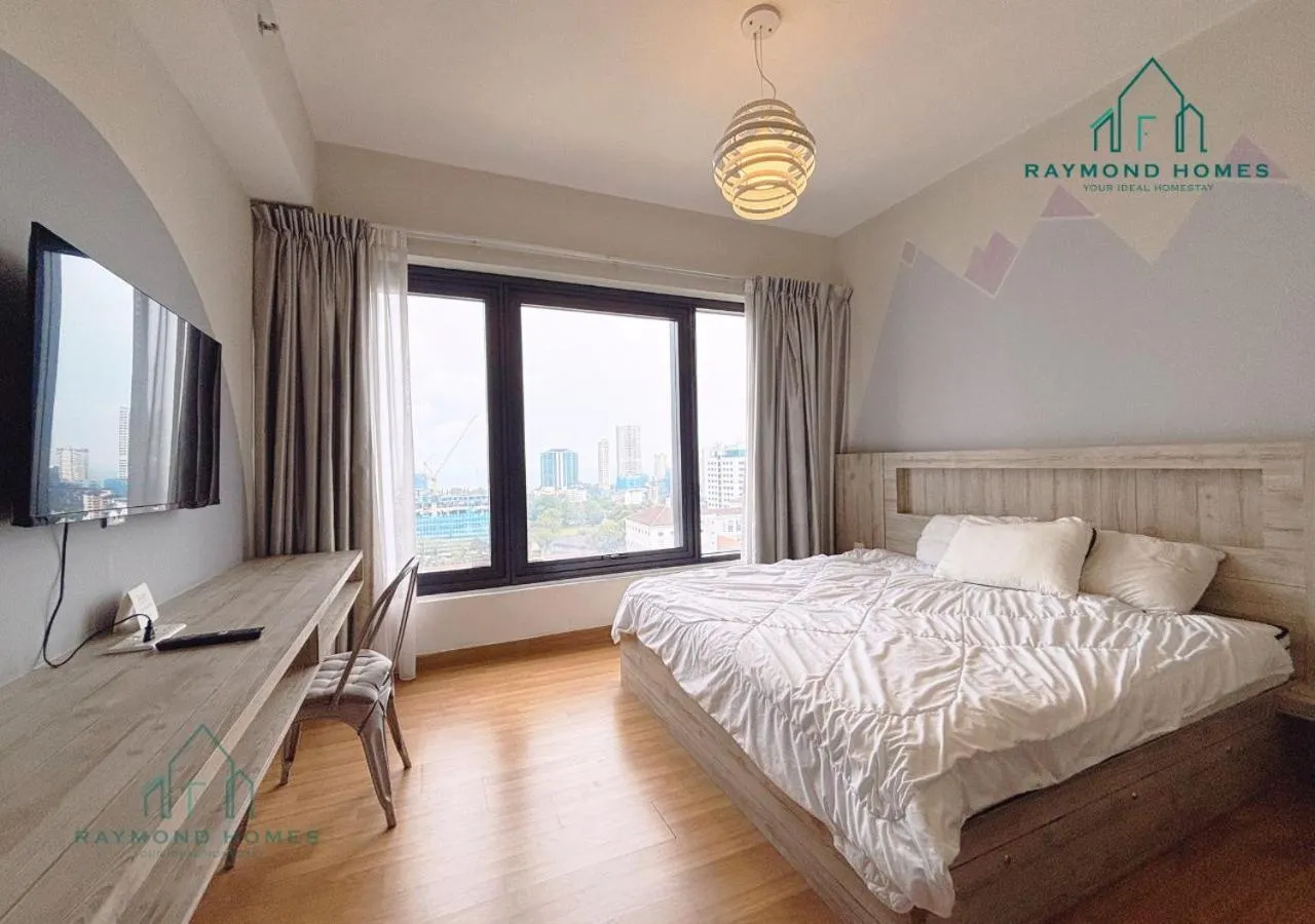 Bed in Georgetown Tropicana 218 Apartment