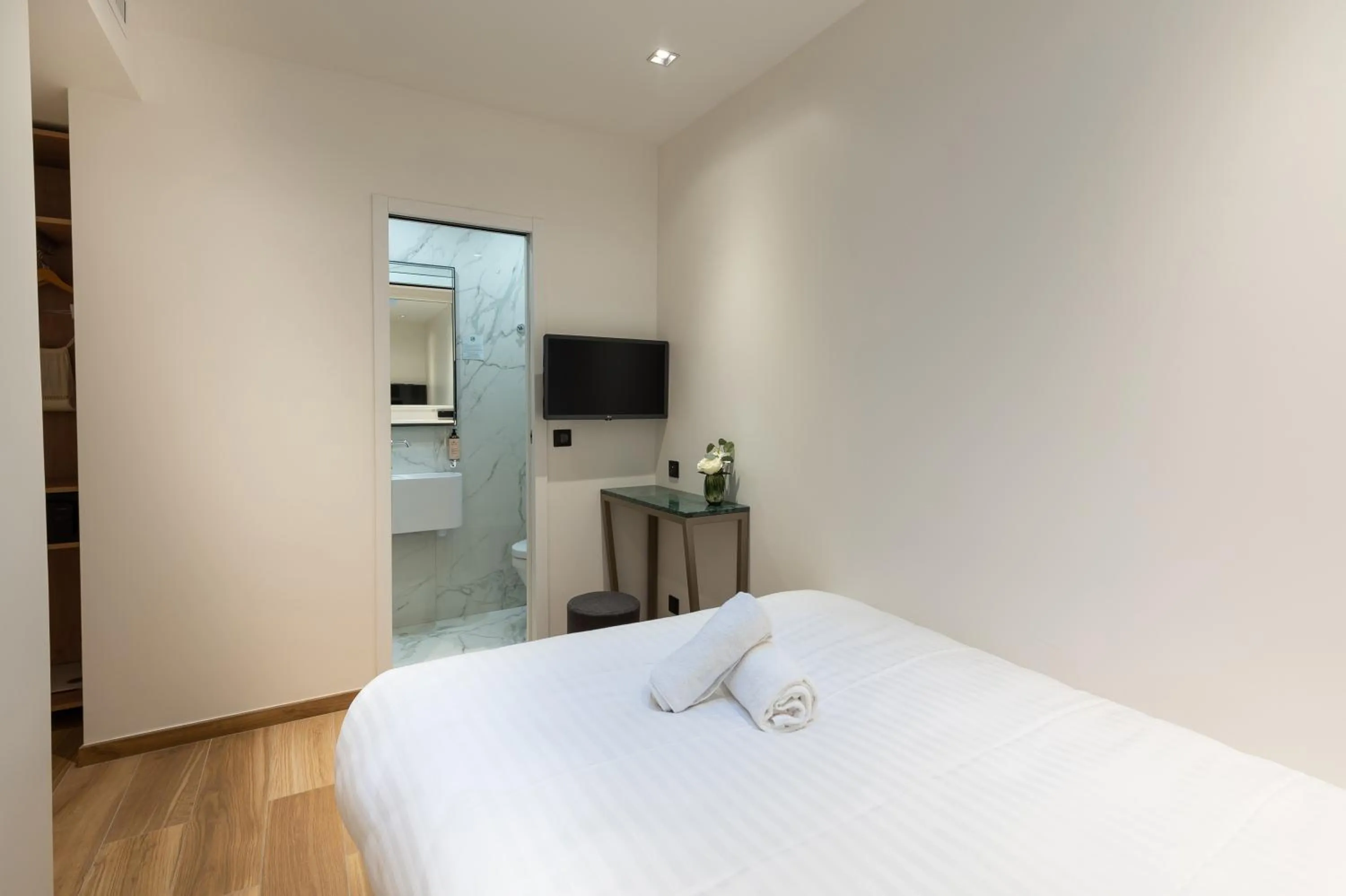 Bed in HOTEL AU COEUR DE REPUBLIQUE