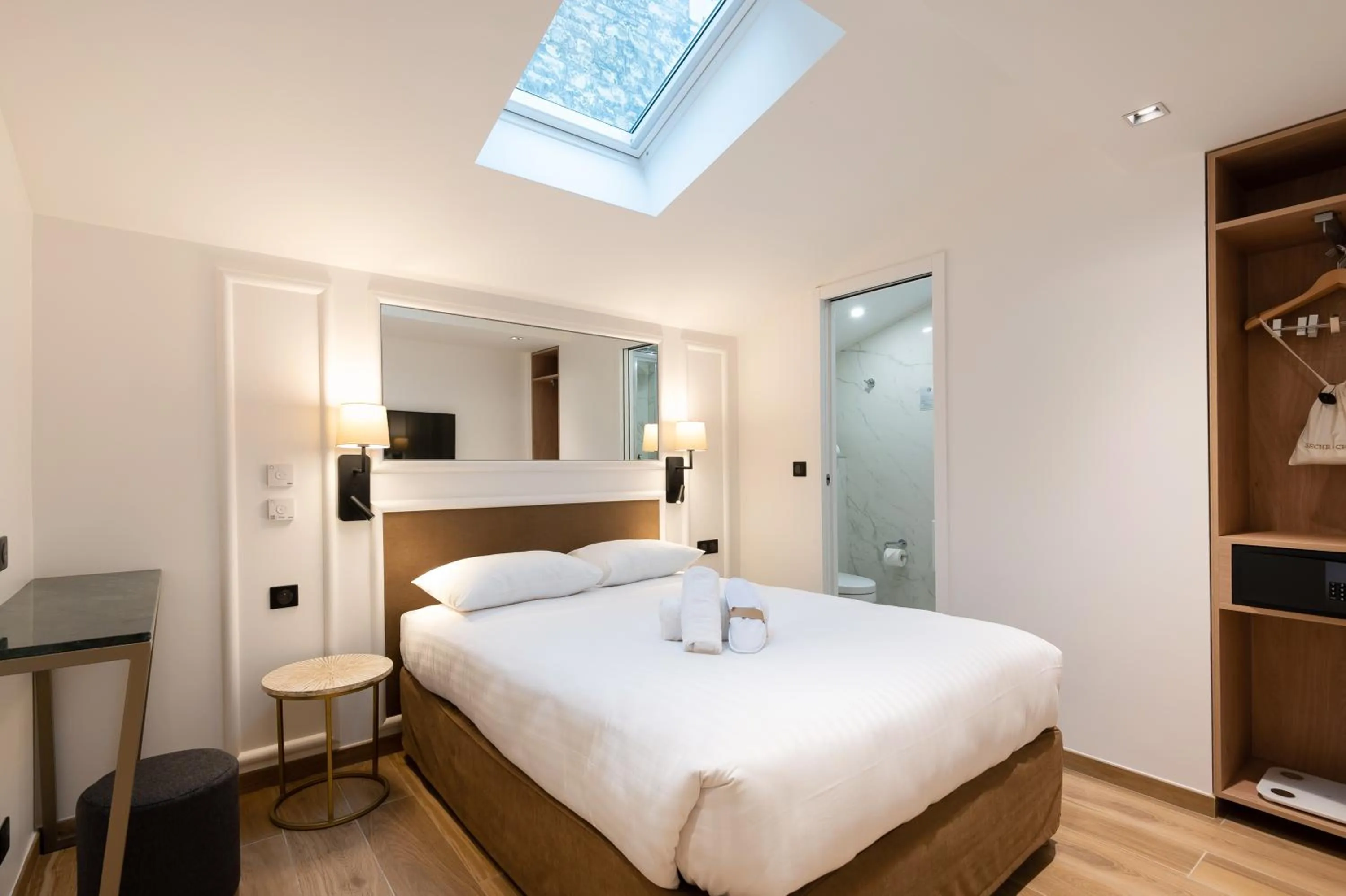 Photo of the whole room, Bed in HOTEL AU COEUR DE REPUBLIQUE