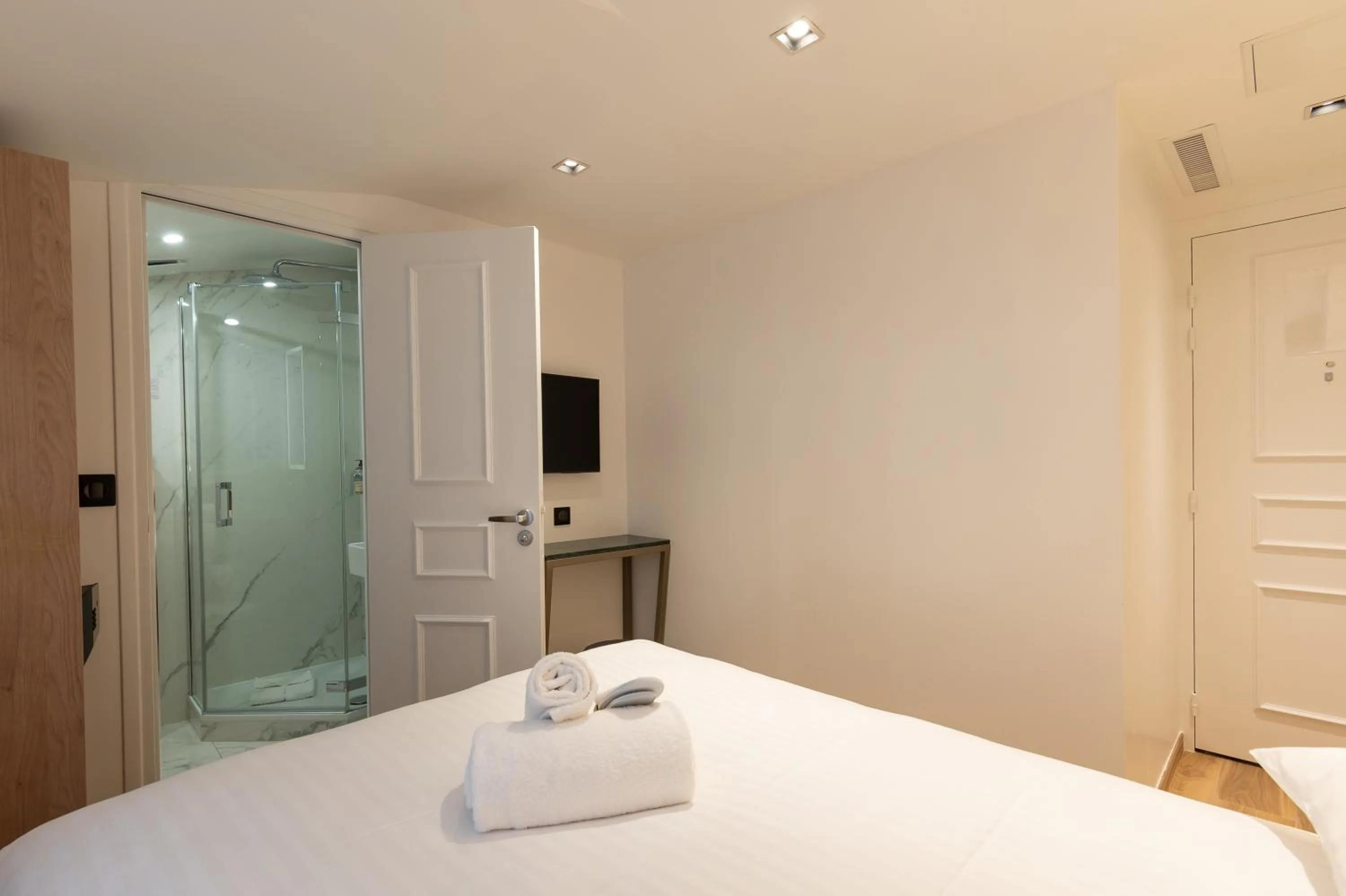 Photo of the whole room, Bed in HOTEL AU COEUR DE REPUBLIQUE