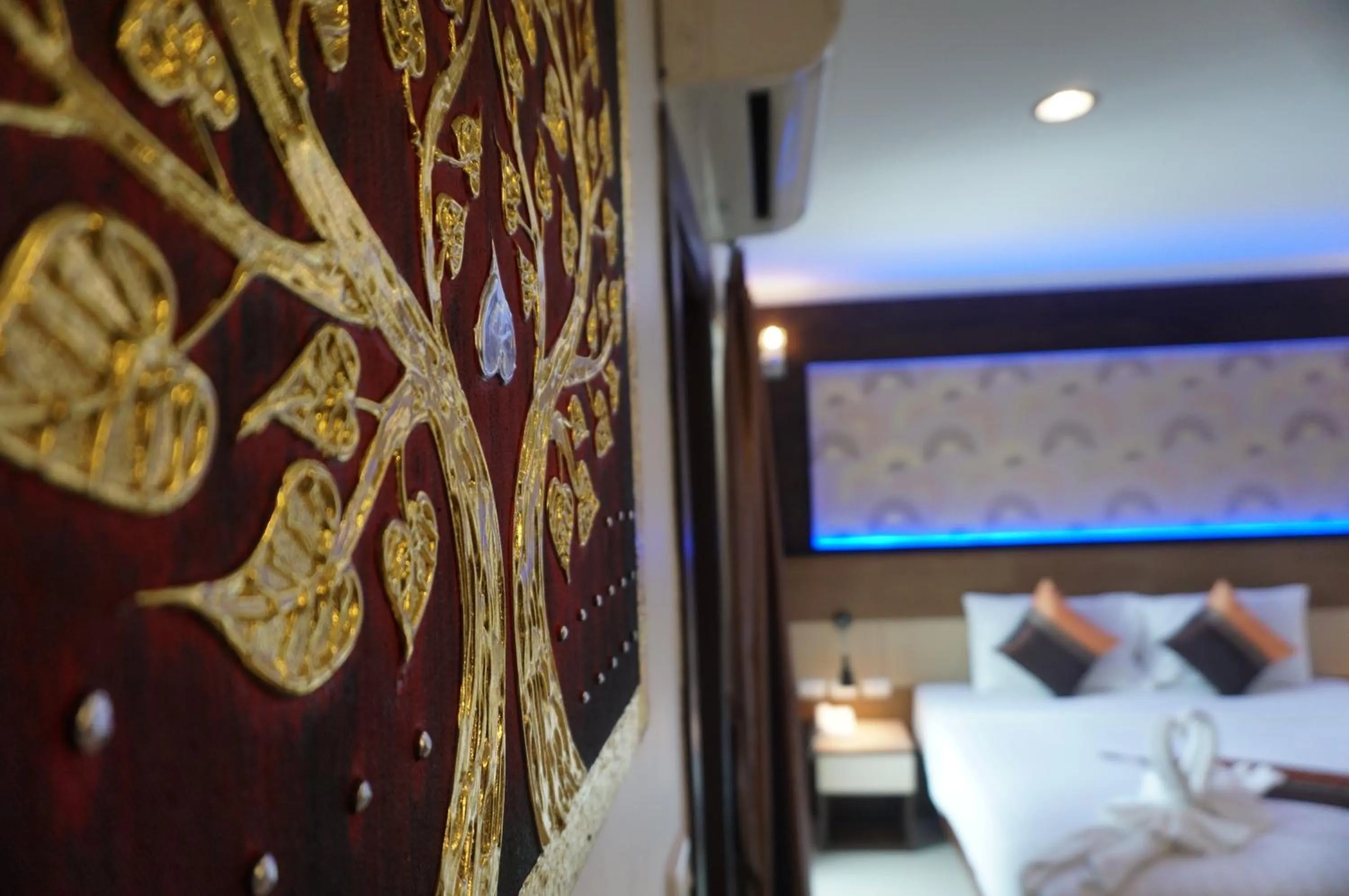 Decorative detail, Bed in Patong Mansion - SHA Certified