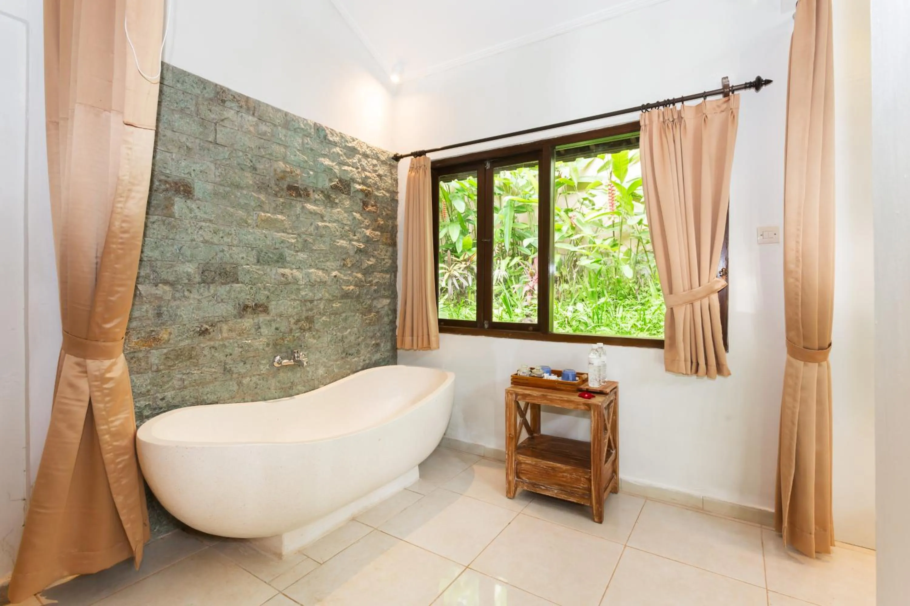 Bathroom, Bed in Rahayu Suites Monkey Forest Ubud
