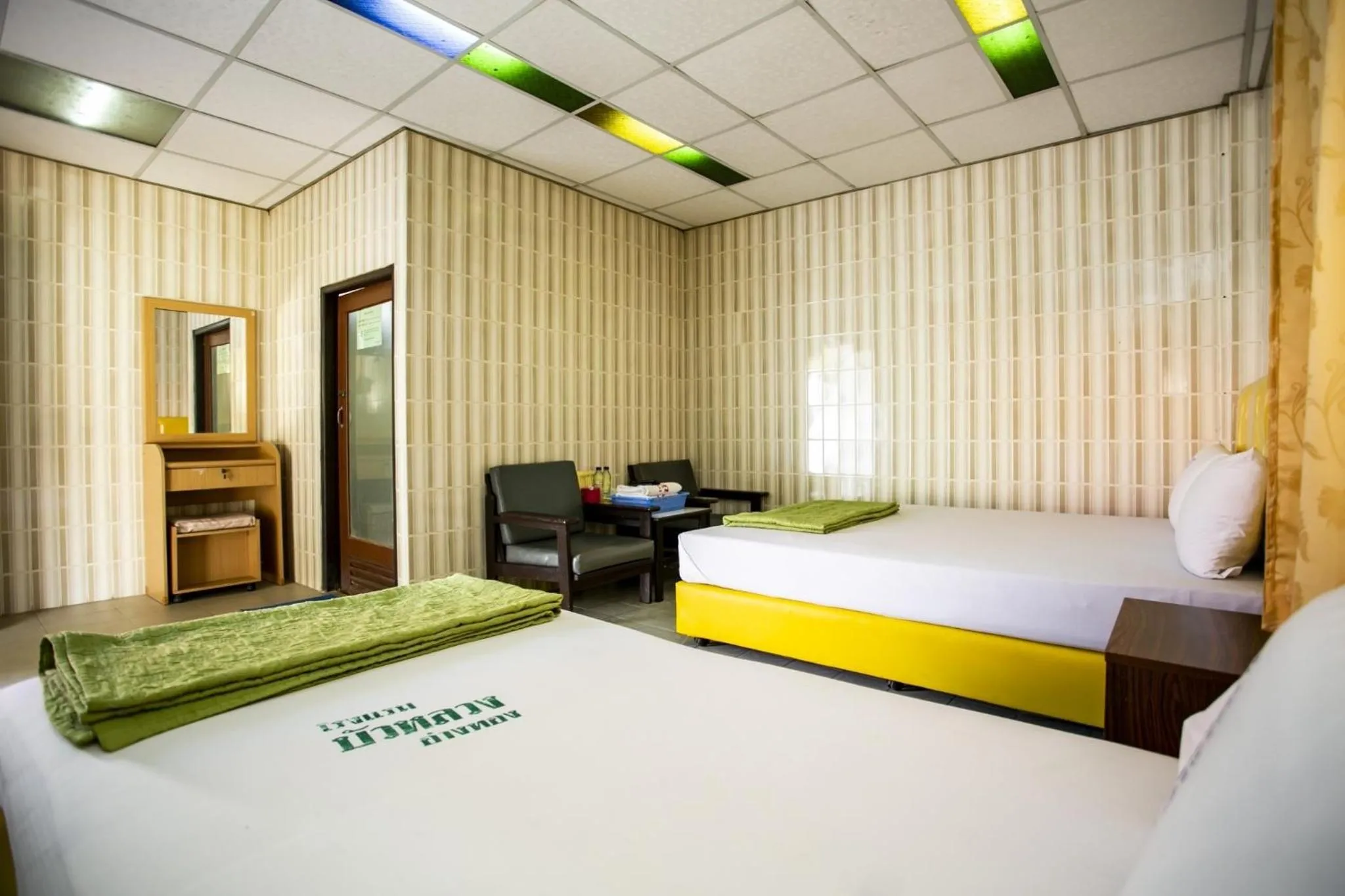 Bed in Bualuang HOTEL