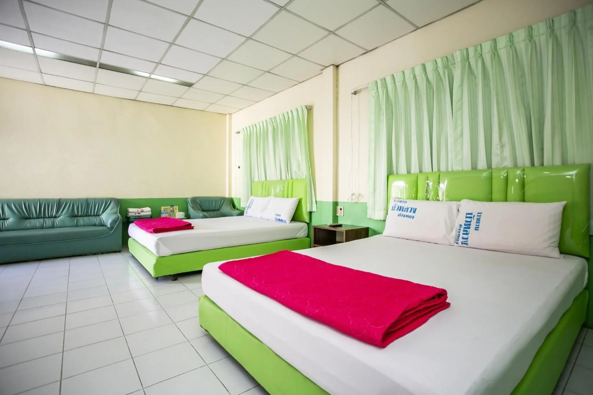 Bed in Bualuang HOTEL