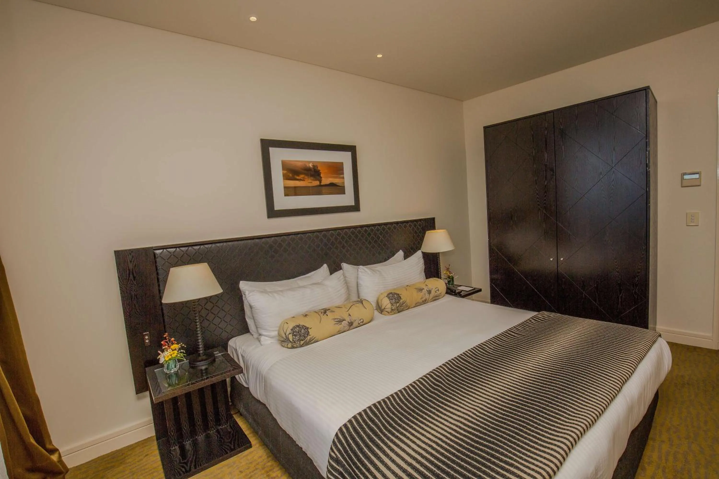 Bedroom, Bed in Grand Papua Hotel, a member of Radisson Individuals