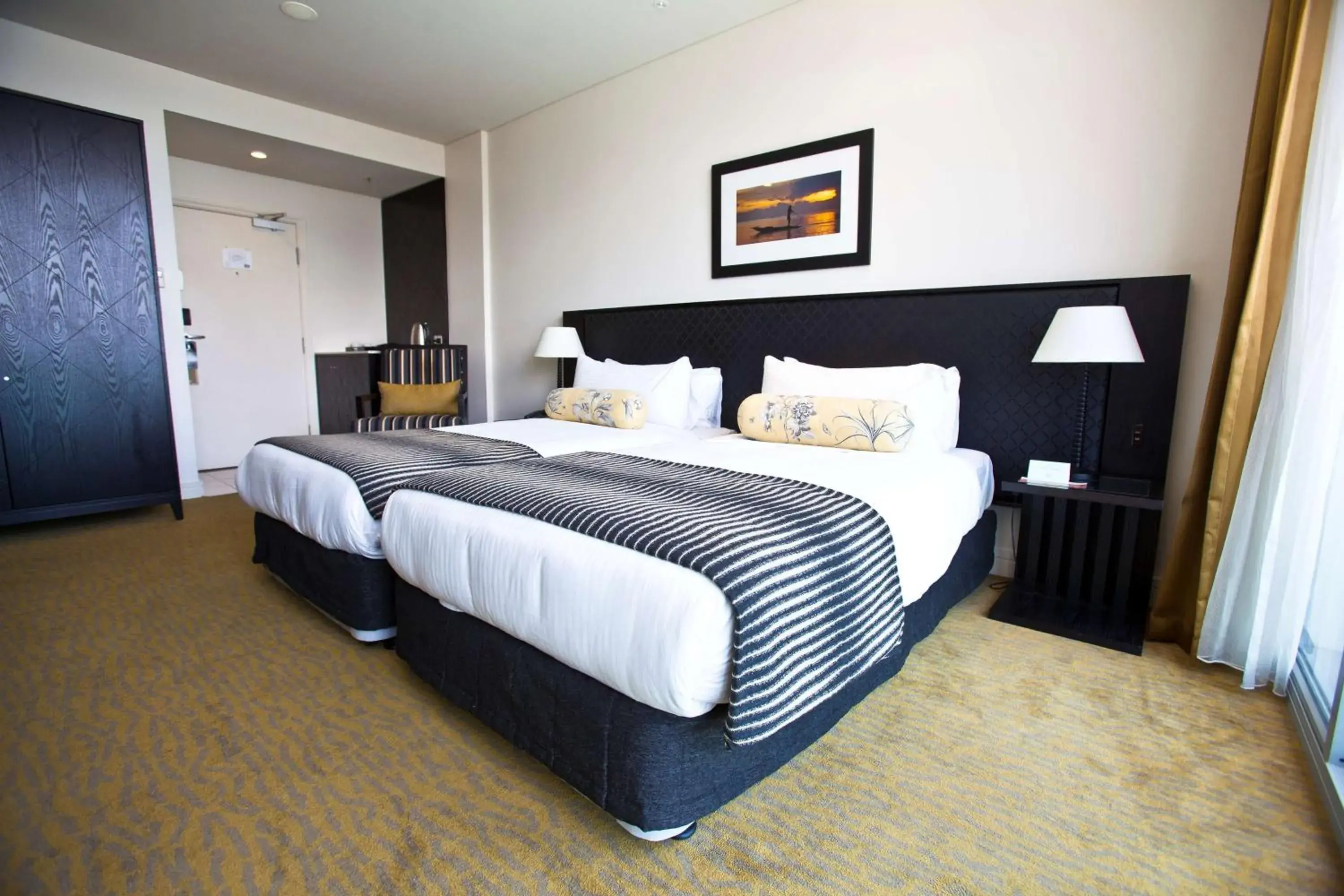 Bedroom, Bed in Grand Papua Hotel, a member of Radisson Individuals Bedroom, Bed in Grand Papua Hotel, a member of Radisson Individuals