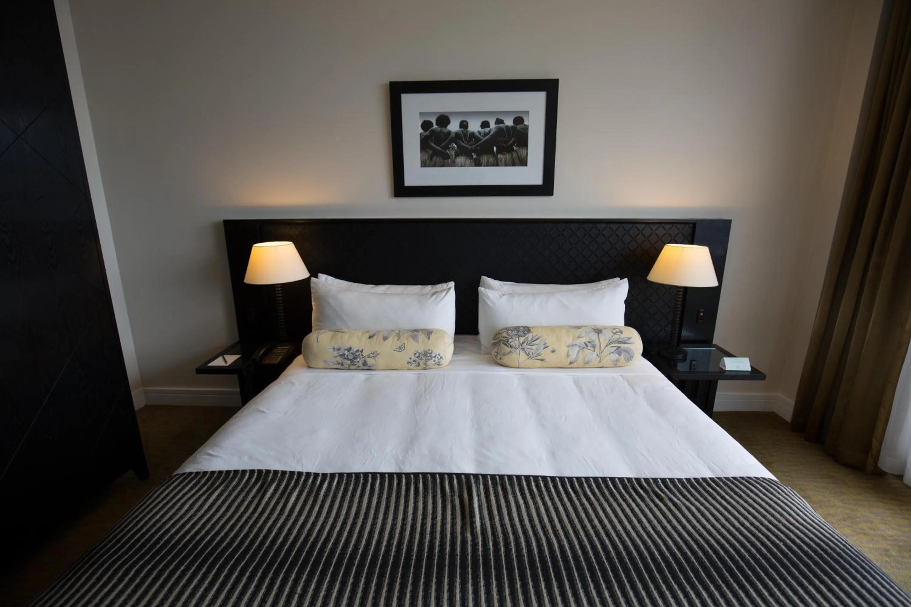 Bed in Grand Papua Hotel