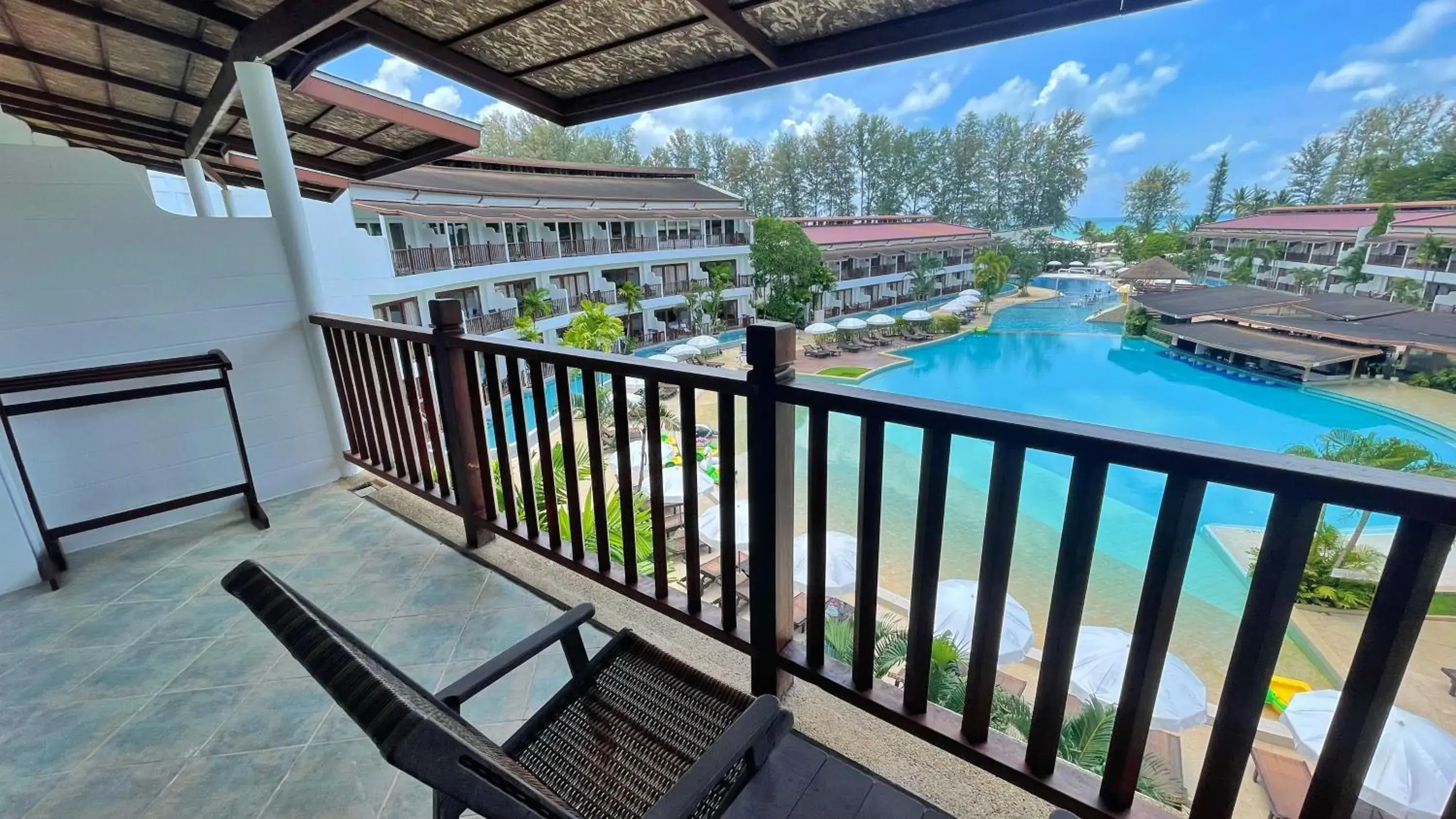 Pool view in Arinara Beach Resort Phuket - SHA Extra Plus Pool view in Arinara Beach Resort Phuket - SHA Extra Plus