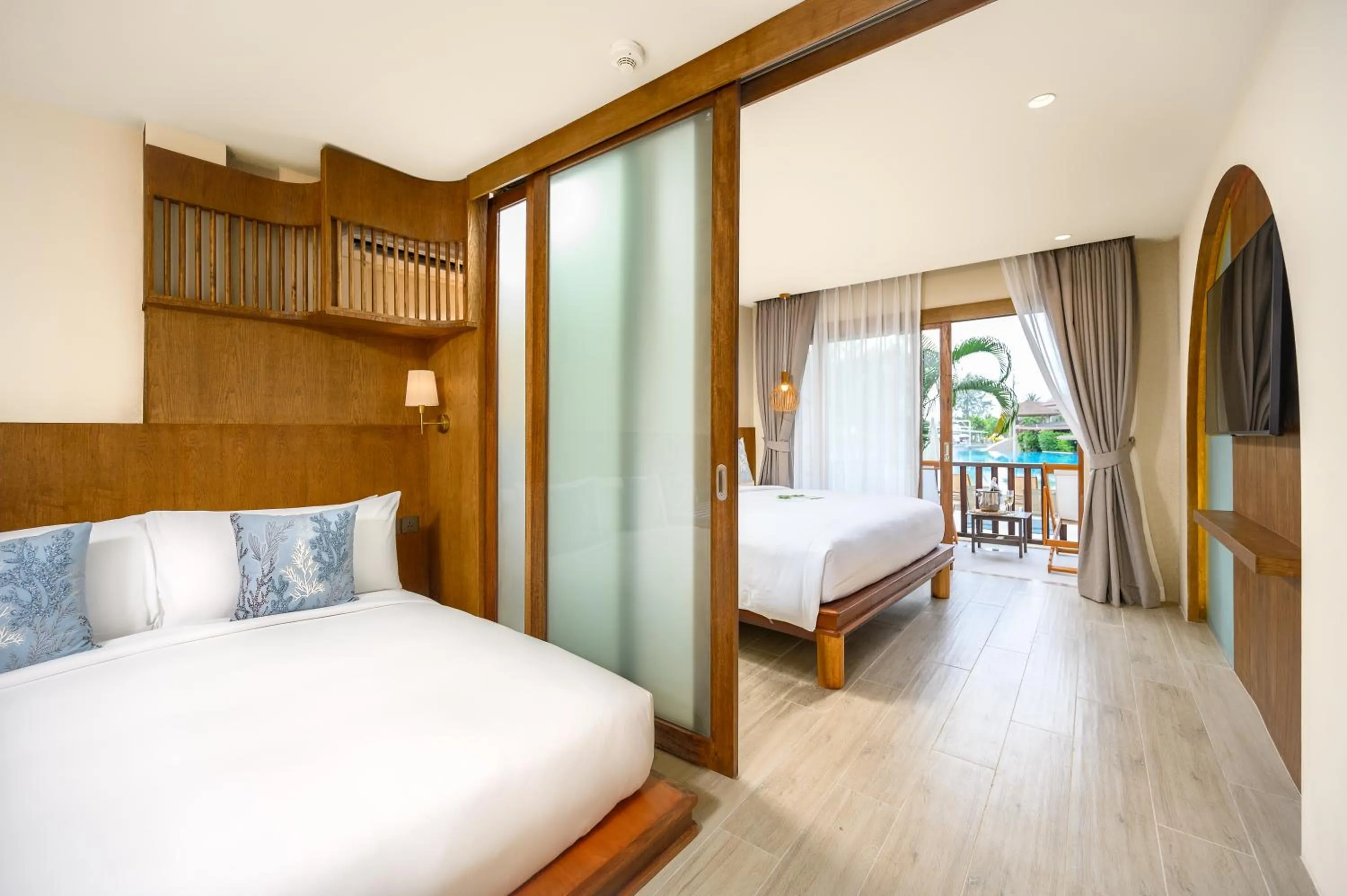Bed in Arinara Beach Resort Phuket - SHA Extra Plus