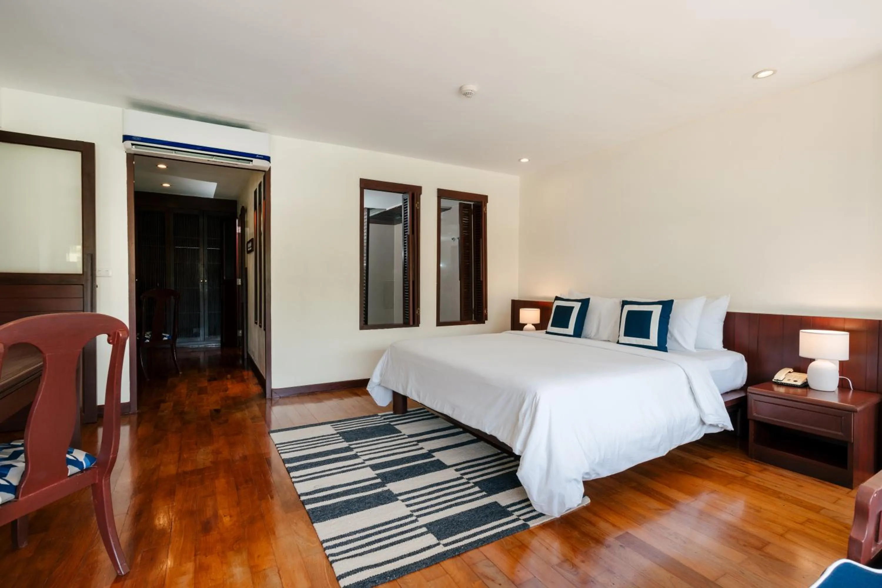 Bed in Arinara Beach Resort Phuket - SHA Extra Plus