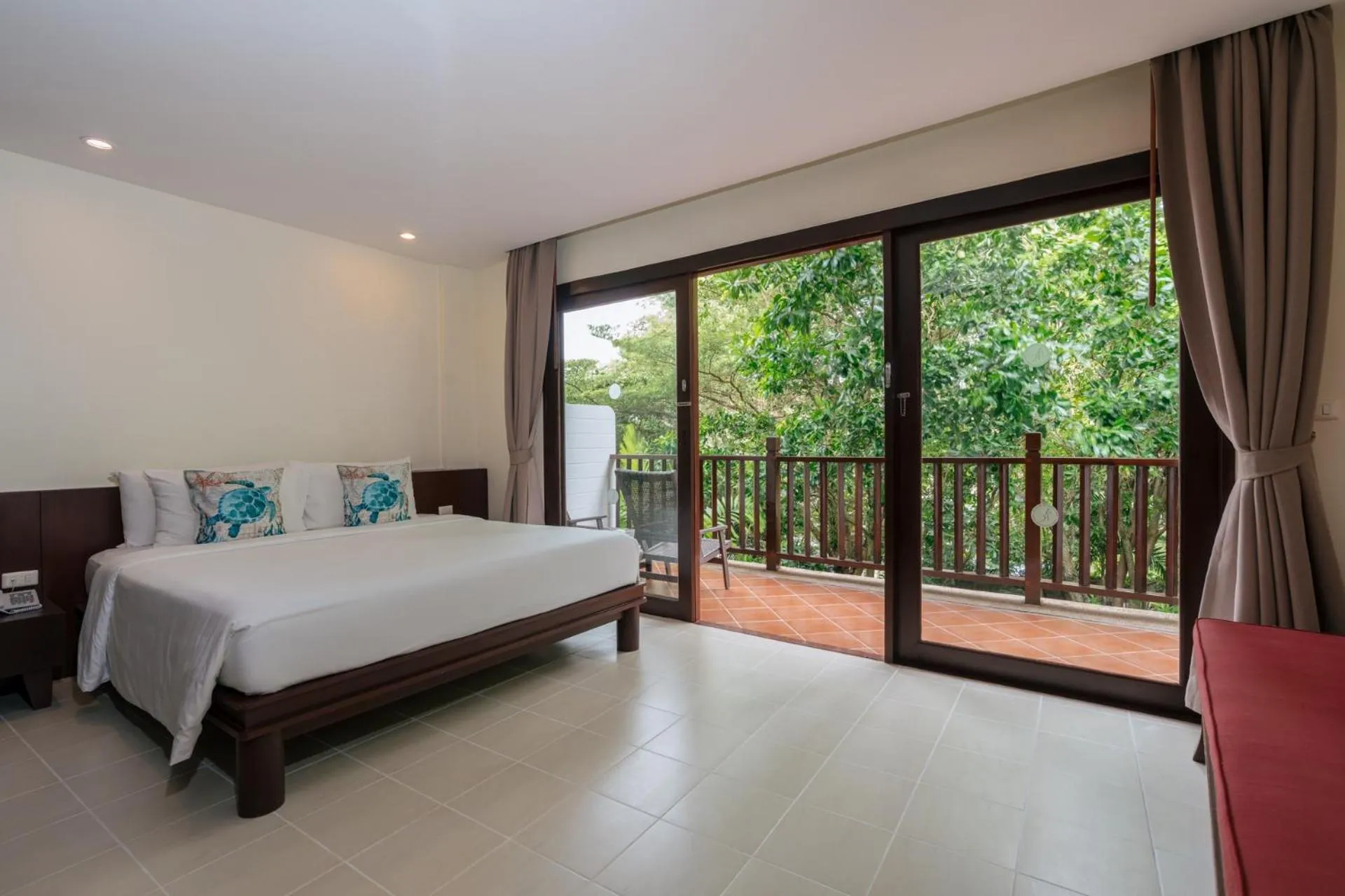 Bed in Arinara Beach Resort Phuket - SHA Extra Plus