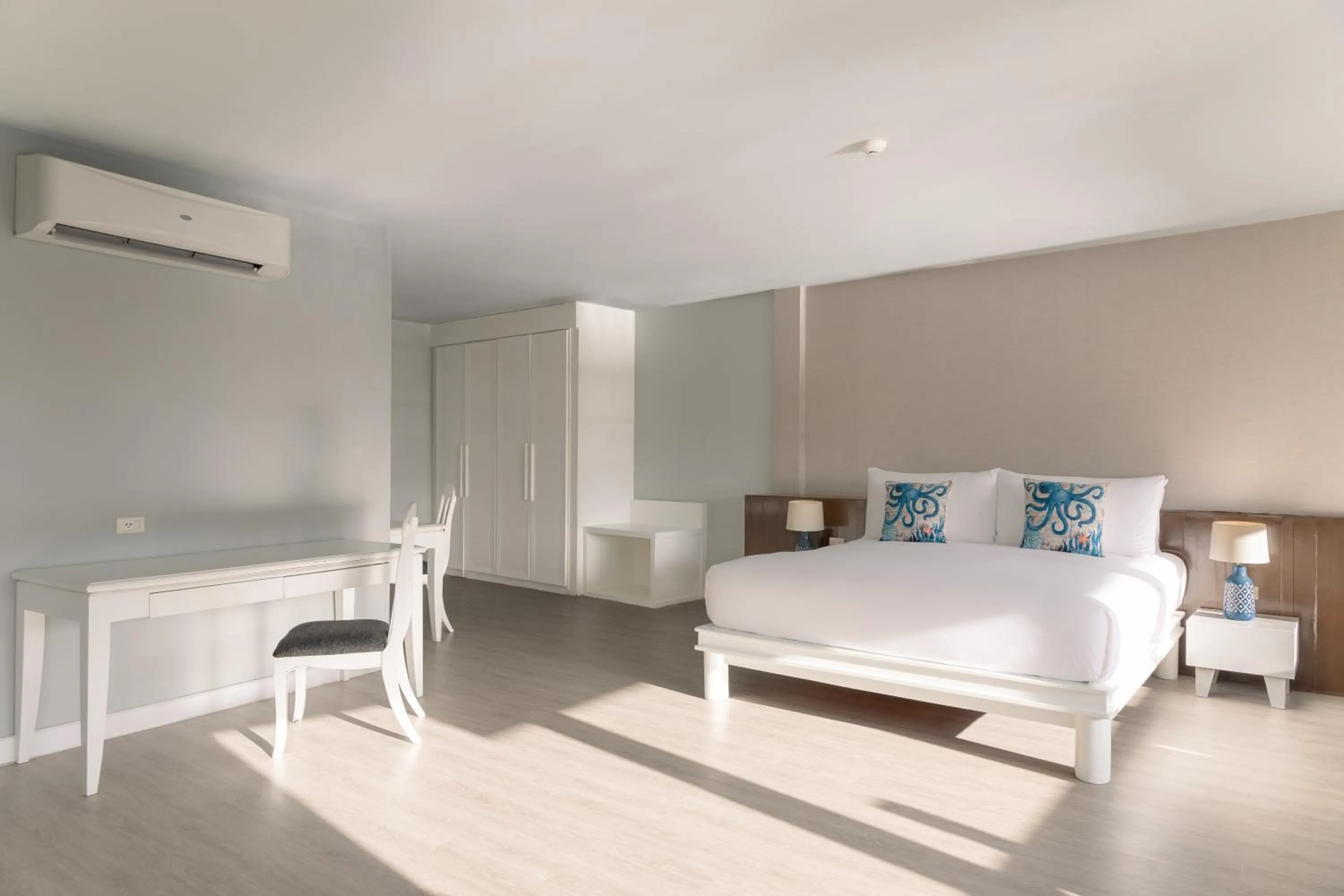 Bed in Arinara Beach Resort Phuket - SHA Extra Plus