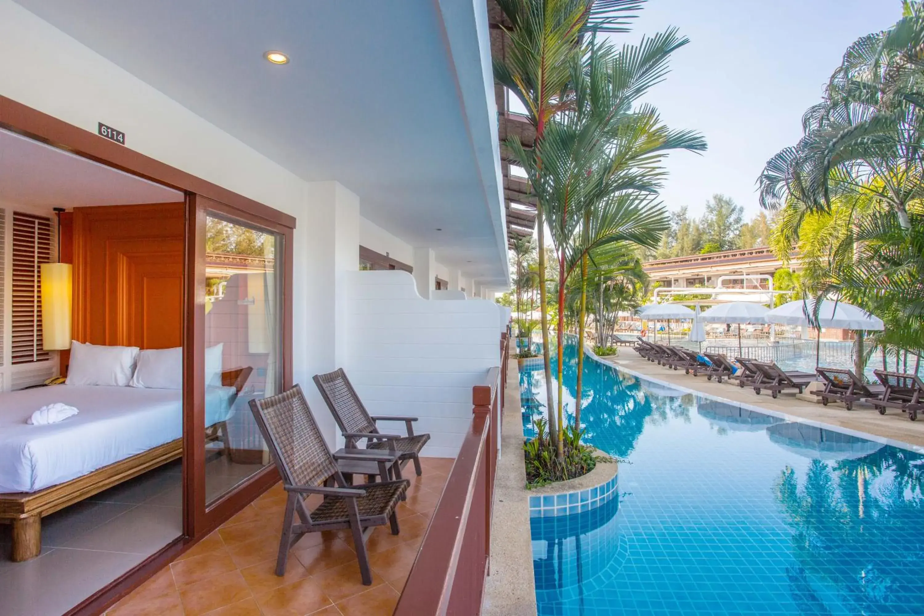 Swimming pool in Arinara Beach Resort Phuket - SHA Extra Plus Swimming pool in Arinara Beach Resort Phuket - SHA Extra Plus