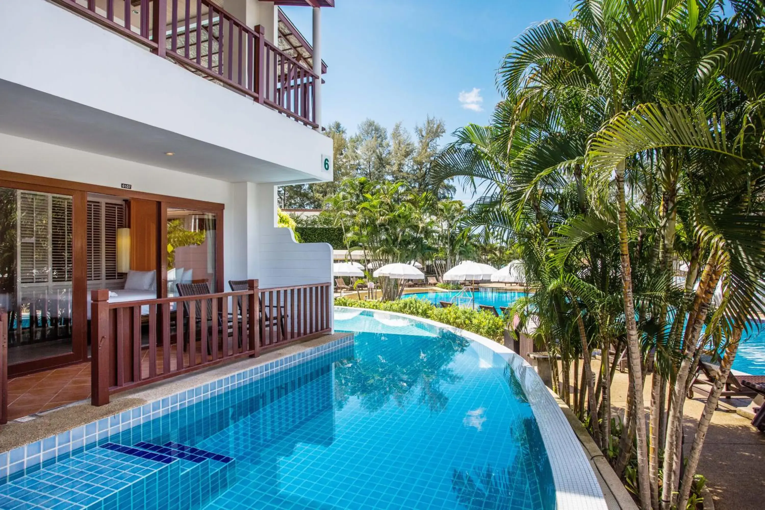 Pool view in Arinara Beach Resort Phuket - SHA Extra Plus Pool view in Arinara Beach Resort Phuket - SHA Extra Plus