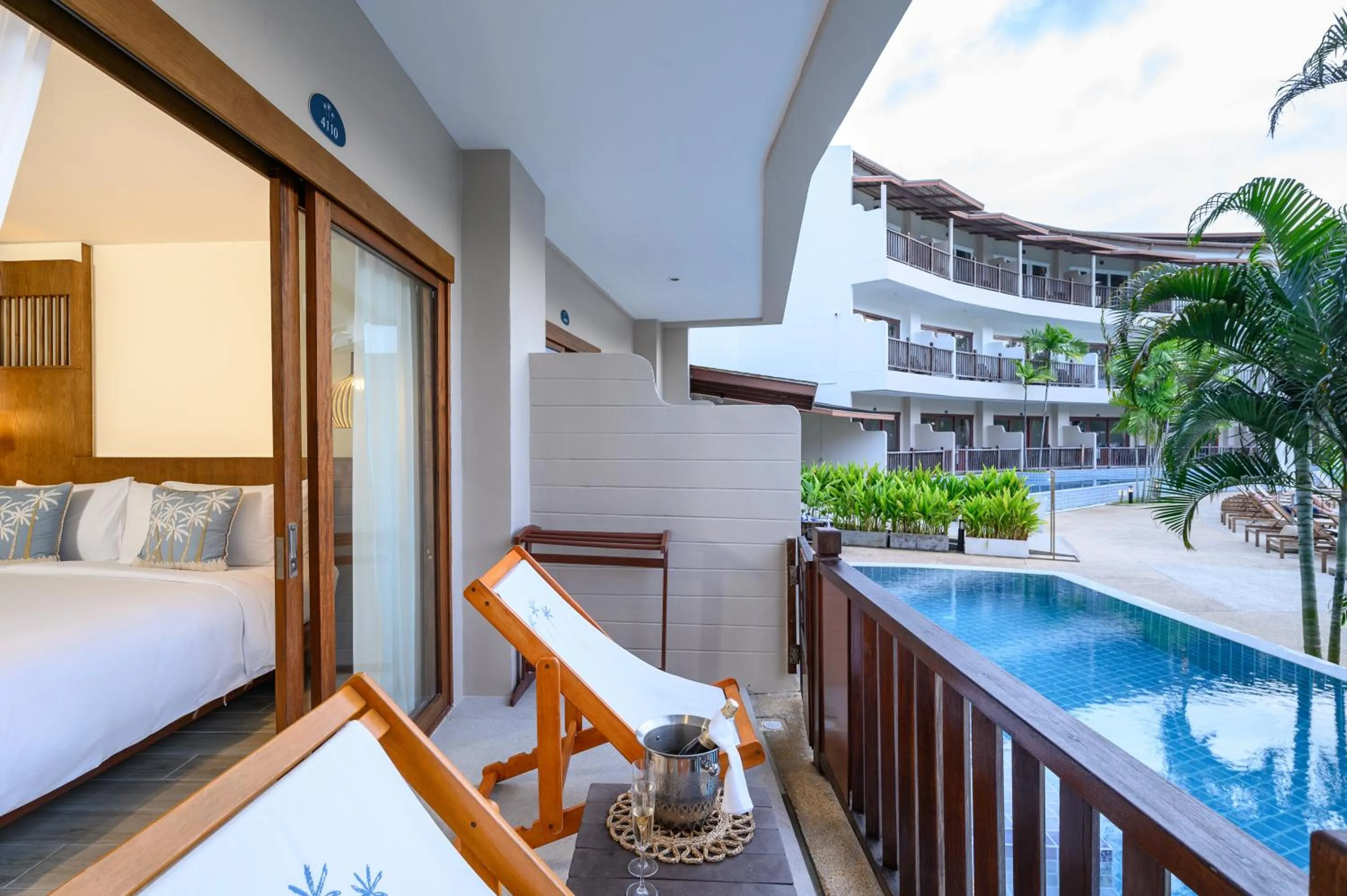 Bed in Arinara Beach Resort Phuket - SHA Extra Plus