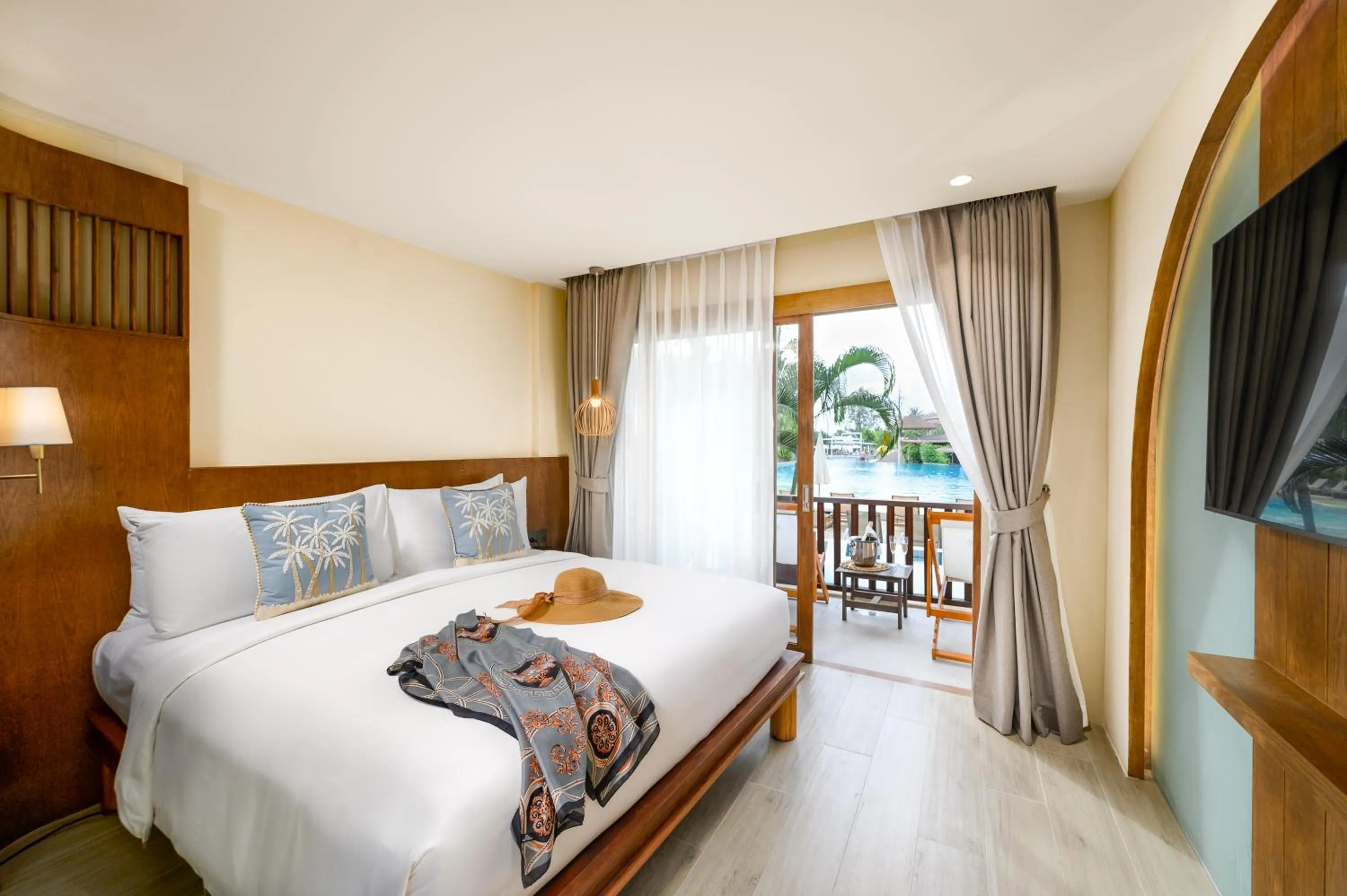 Bed in Arinara Beach Resort Phuket - SHA Extra Plus