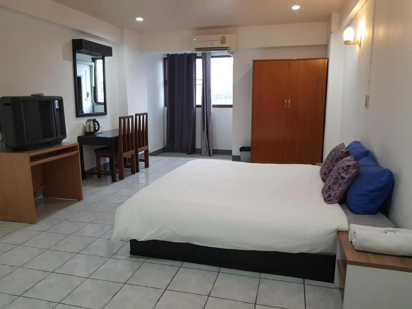 Bed in โรงแรมวินบางนา Win Bangna Hotel