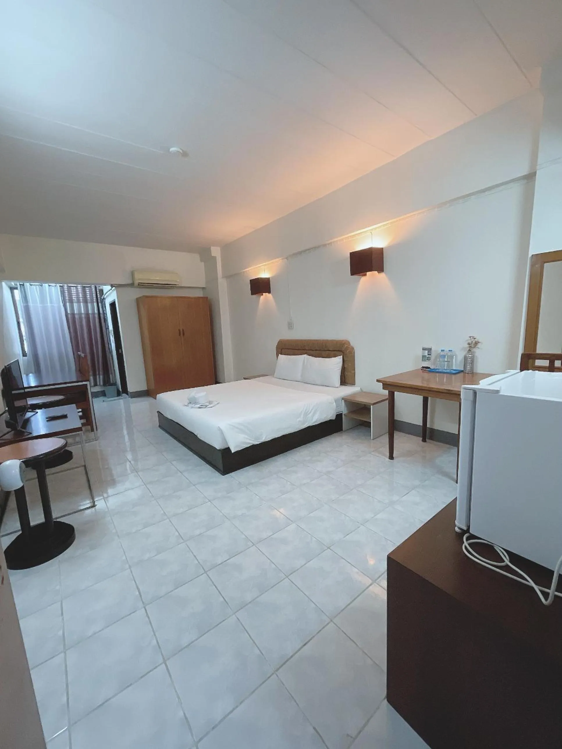 Bed in โรงแรมวินบางนา Win Bangna Hotel