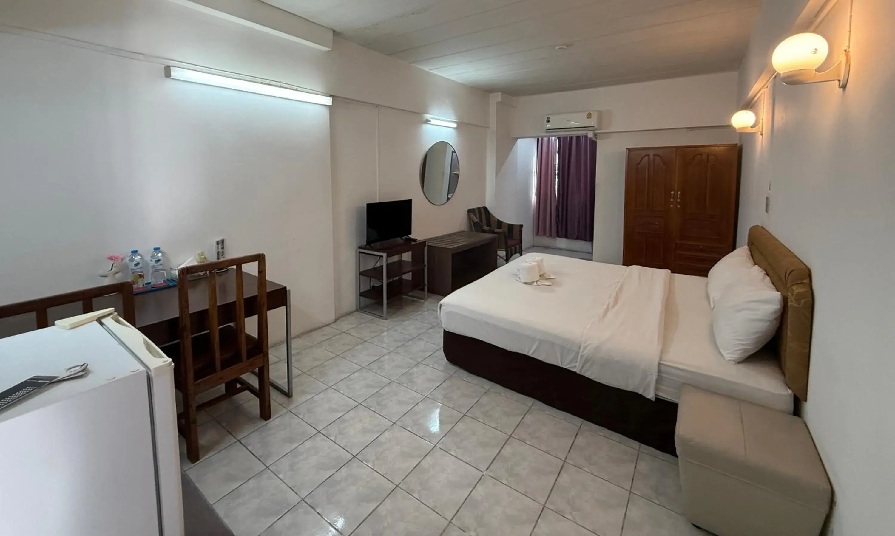 Bed in โรงแรมวินบางนา Win Bangna Hotel Bed in โรงแรมวินบางนา Win Bangna Hotel