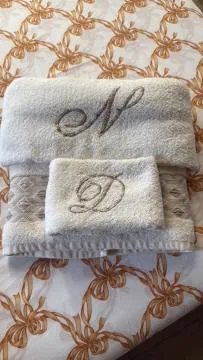 Bed in NICOLE DONEY LOCAZIONE TURISTICA