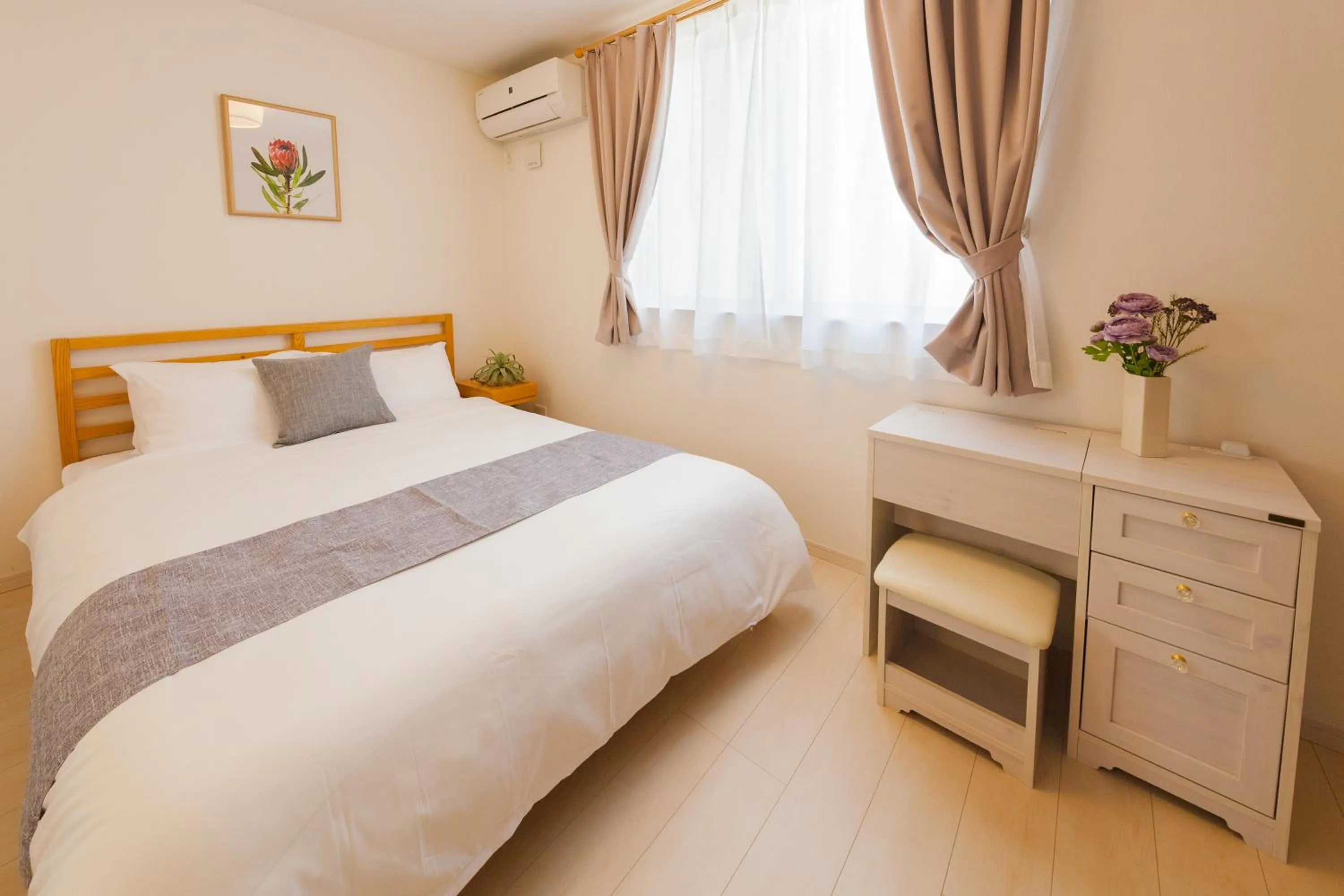 Bed in Prestige Suites Osaka Kishinosato-Tamade