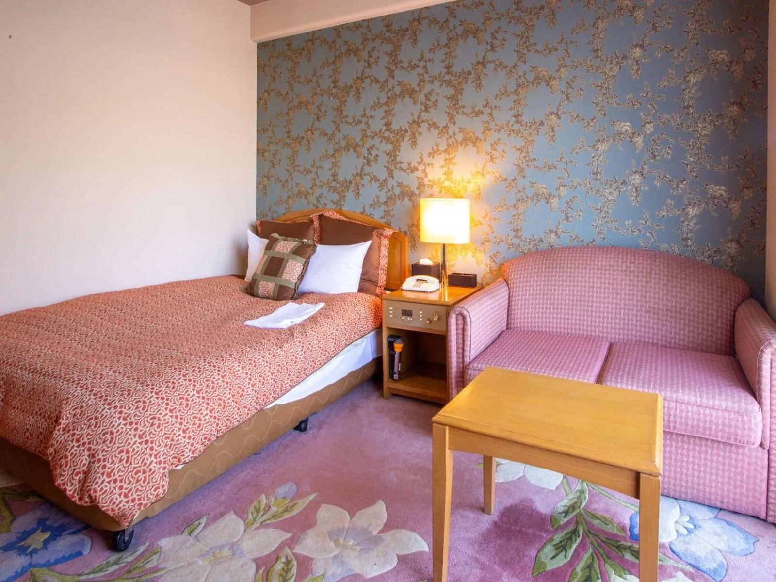 Bed in Hotel Villa Kuretake