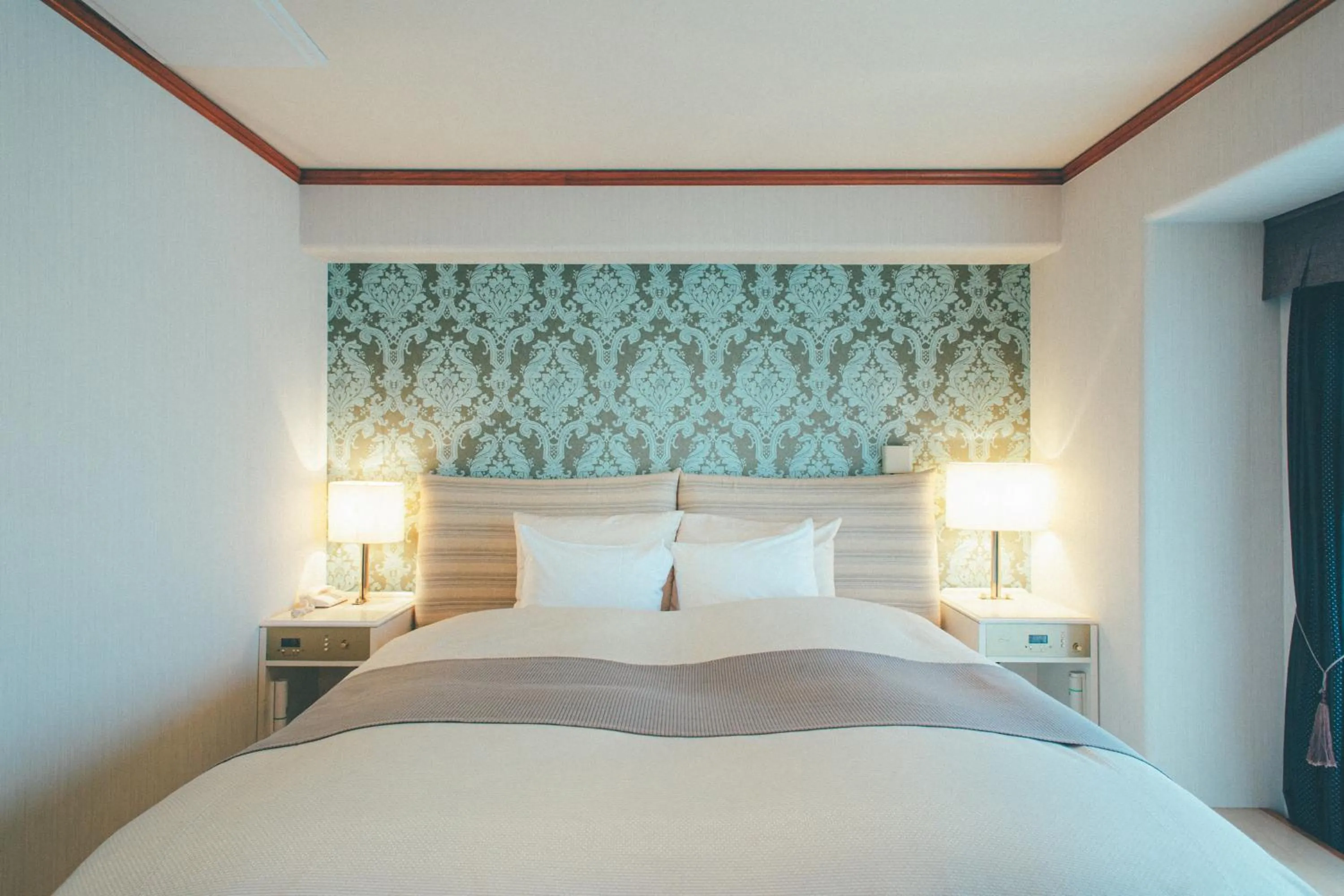 Bed in Hotel Villa Kuretake