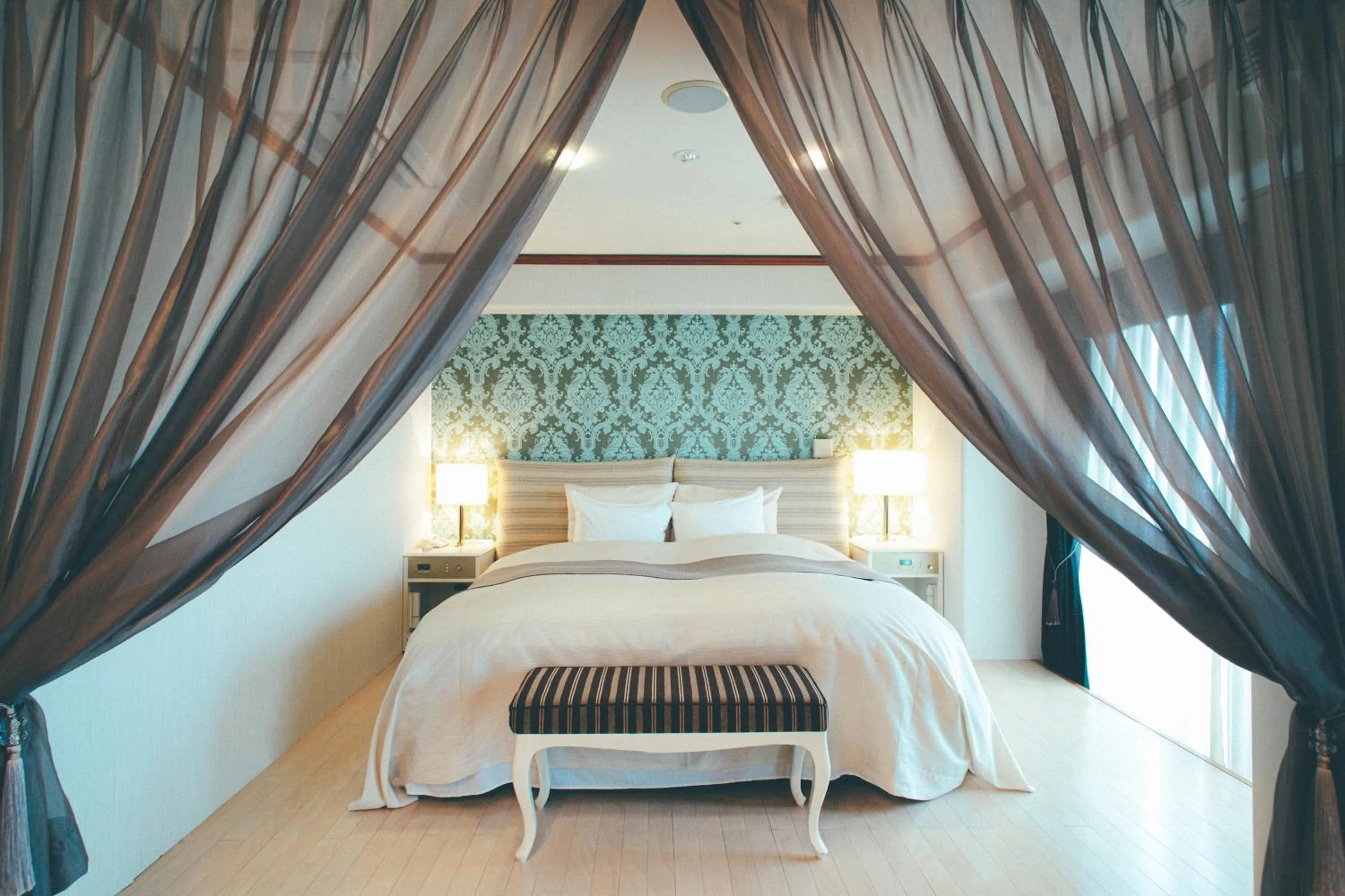 Bed in Hotel Villa Kuretake