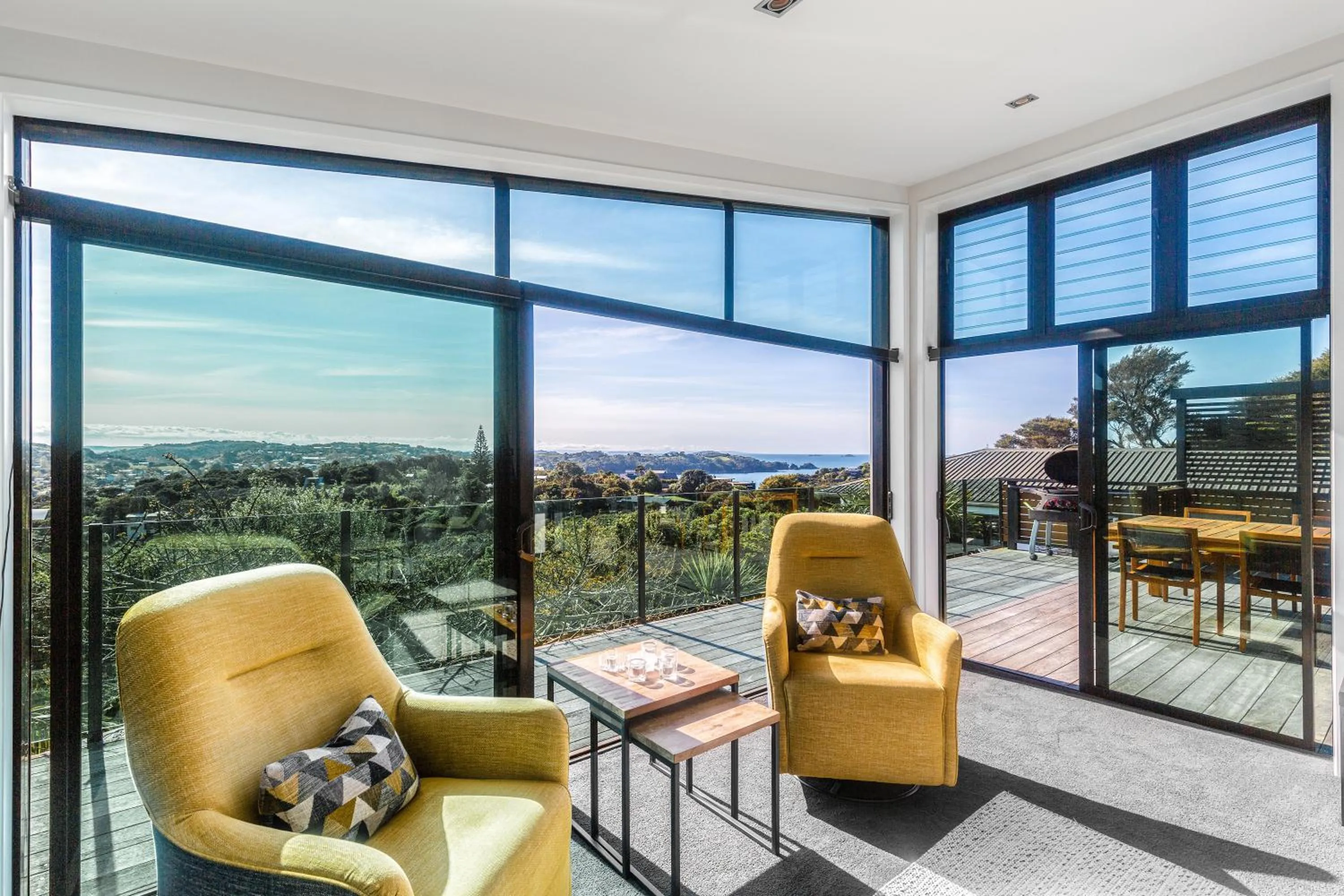 Living room in Taonga with Sea Views by Waiheke Unlimited