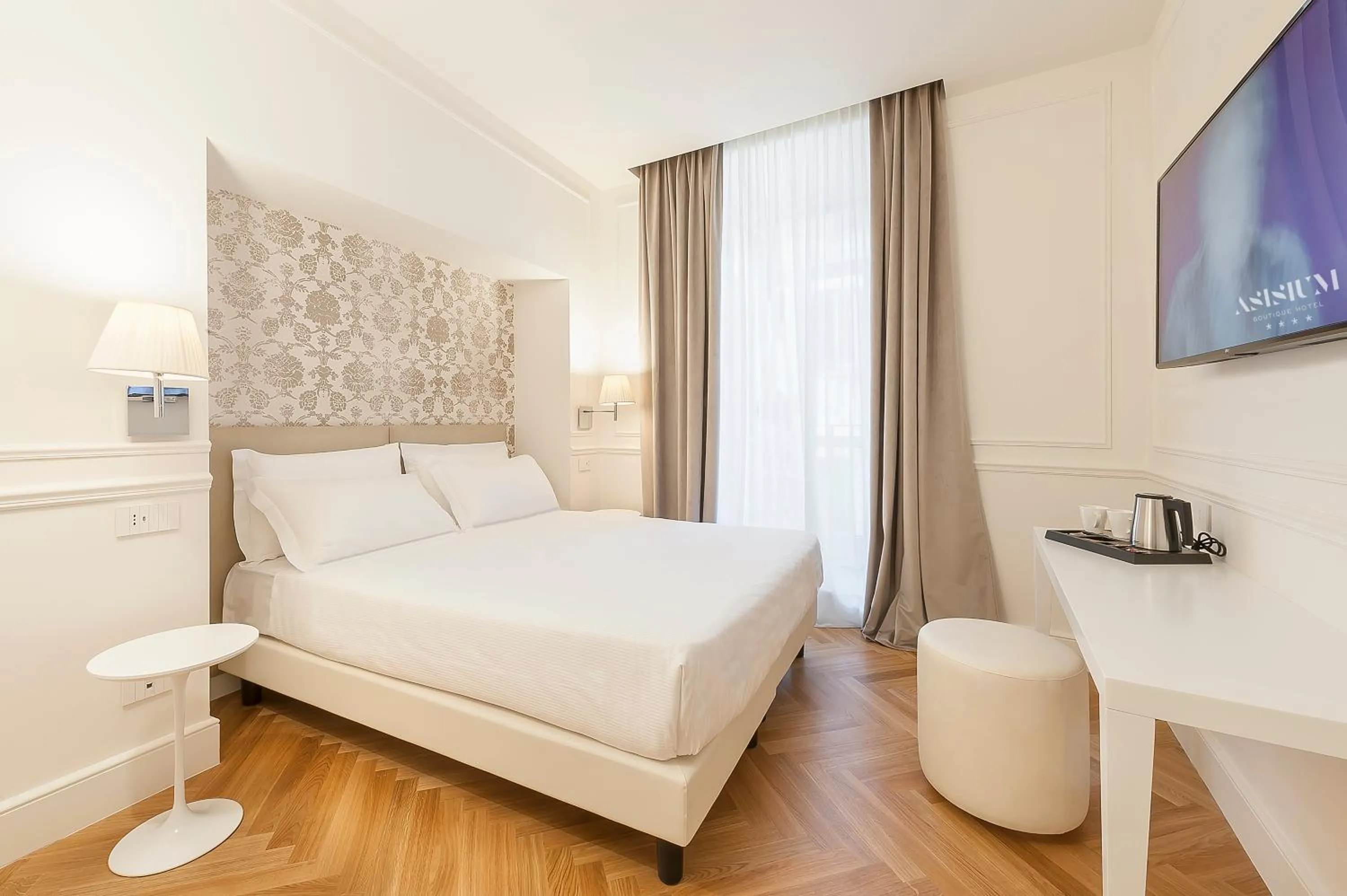 Bed in Asisium Boutique Hotel